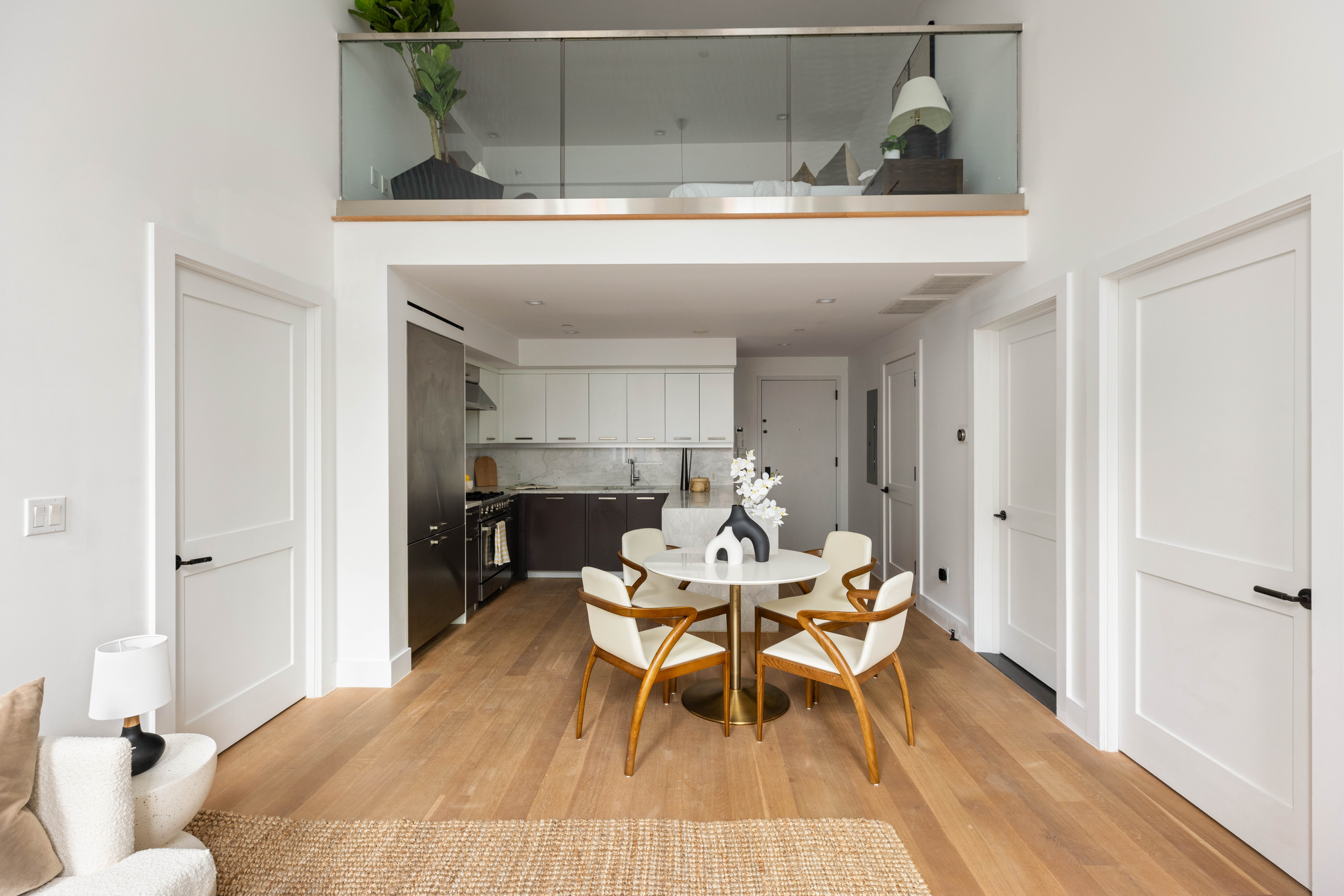 172 North 10th Street, Unit 3D Brooklyn, NY 11211 - Photo 3 of 16 a view of a dining room with a table and chairs