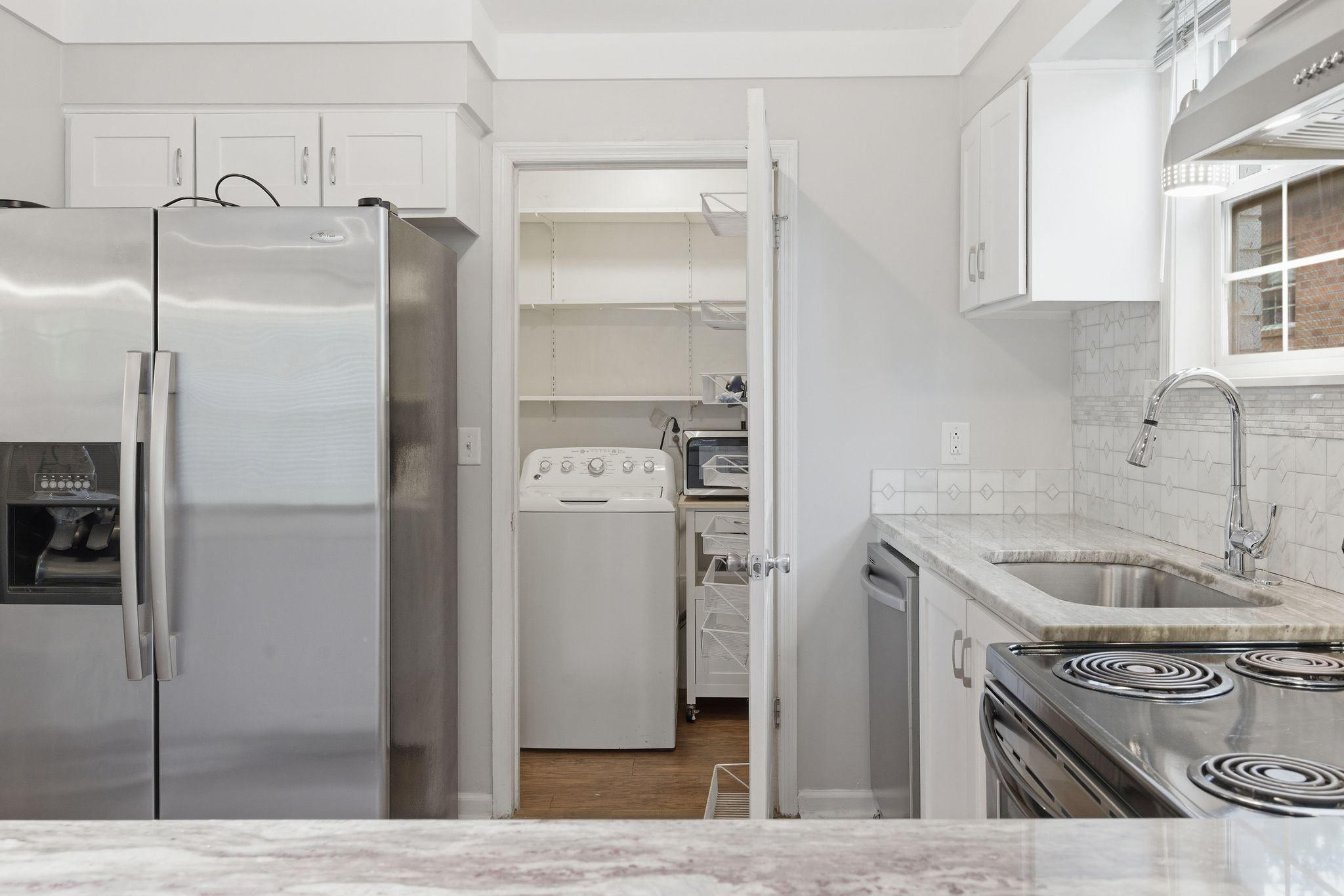 307 Paragon Mills Road Nashville, TN 37211 - Photo 10 of 29 a kitchen with stainless steel appliances granite countertop a refrigerator and a sink