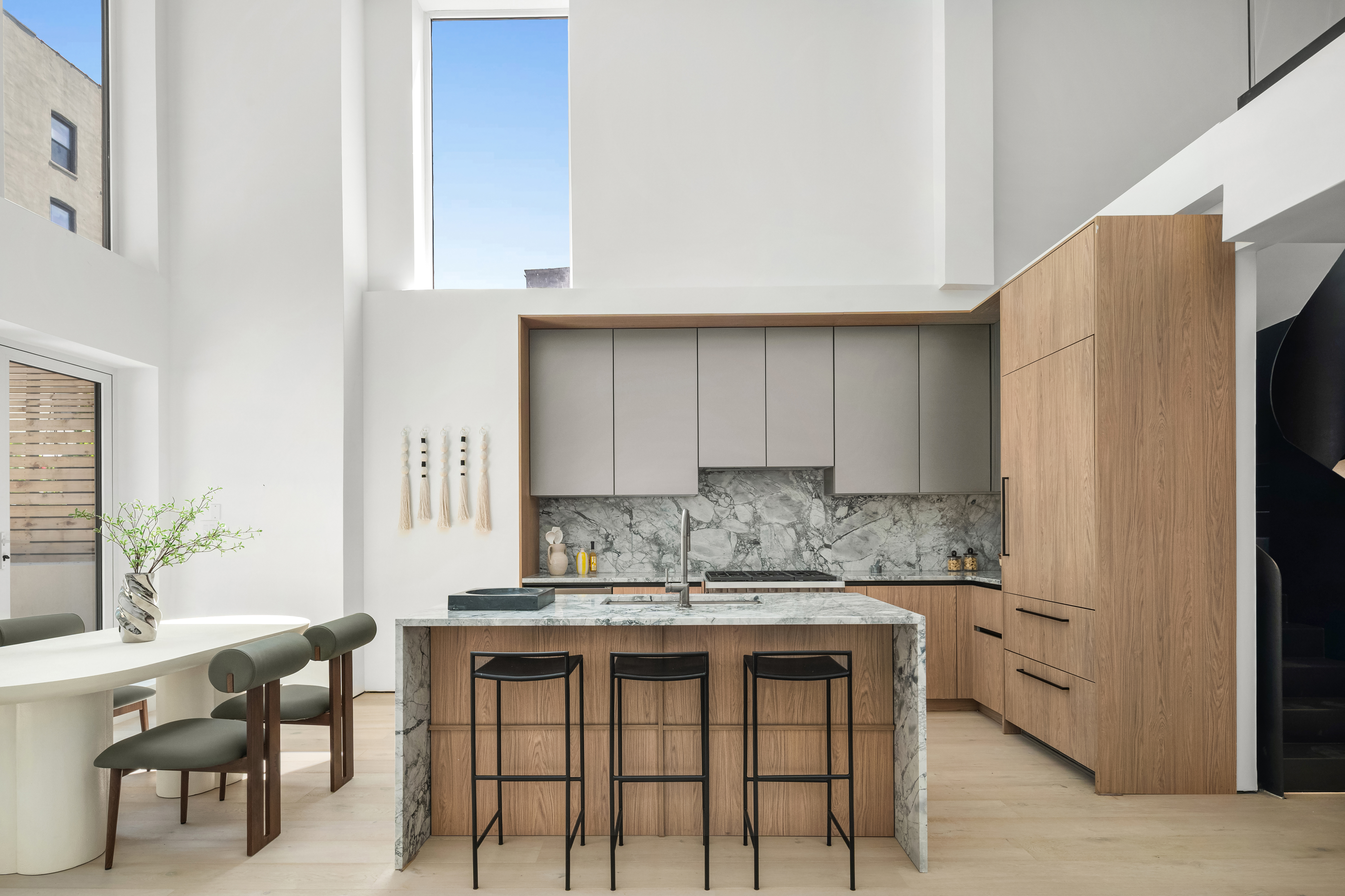 79 South 2nd Street Brooklyn, NY 11249 - Photo 3 of 14 a kitchen with stainless steel appliances granite countertop a sink and a refrigerator