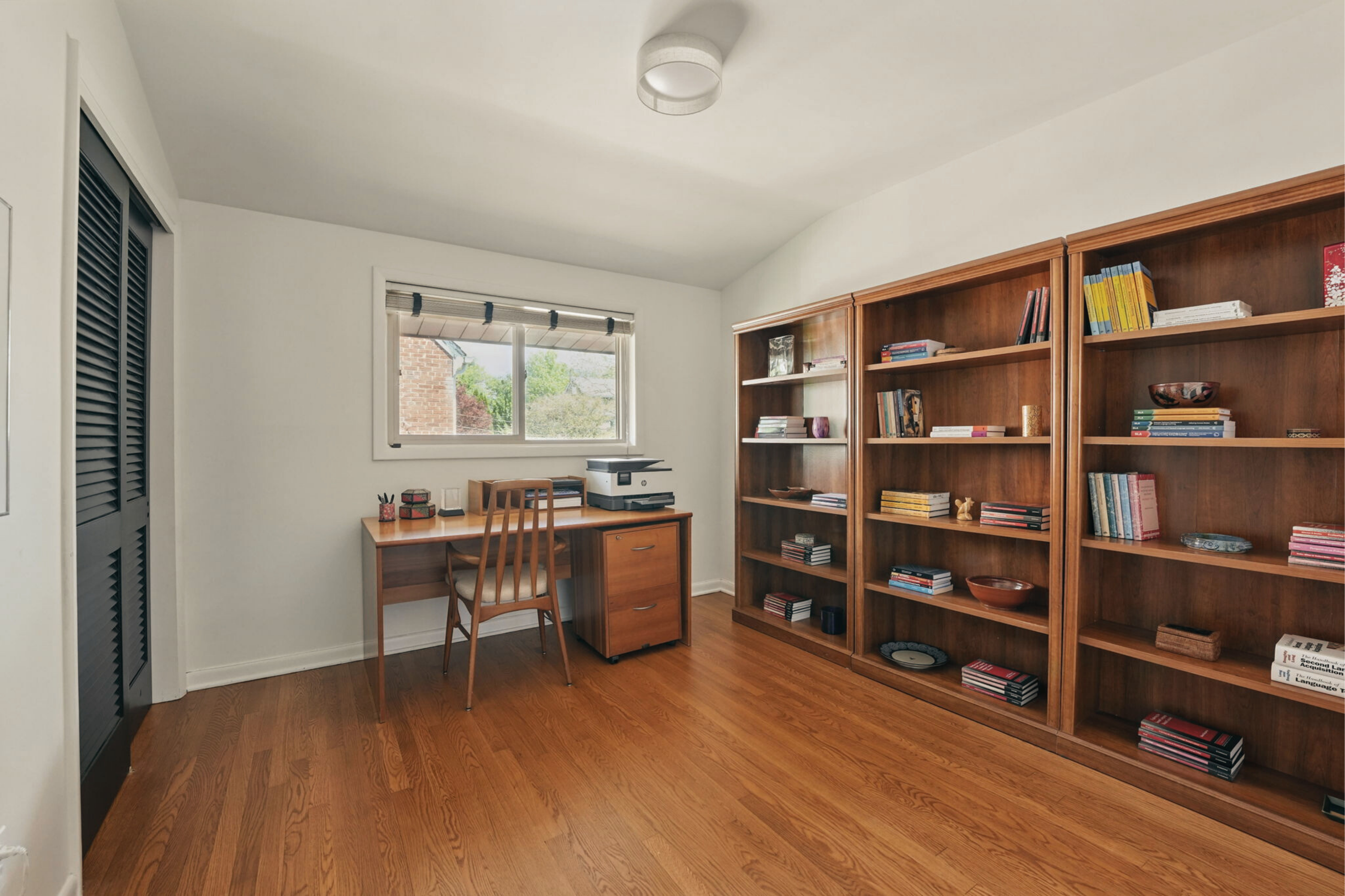 8003 16th Street Northwest Washington, DC 20012 - Photo 30 of 38 a workspace with furniture window and wooden floor