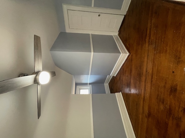 340 Marlborough Road Brooklyn, NY 11226 - Photo 23 of 27 an empty room with wooden floor and windows