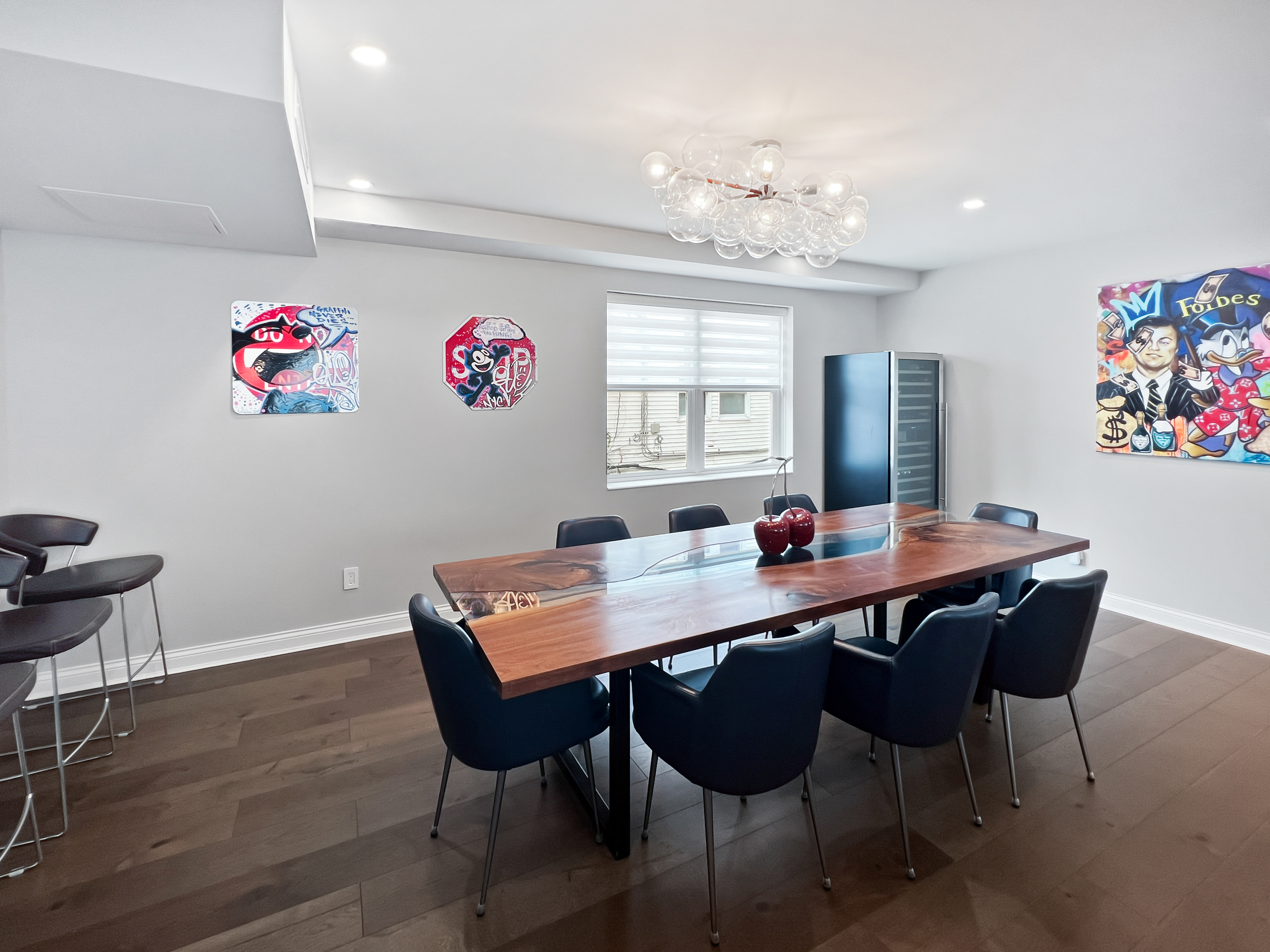 5021 Surf Avenue Brooklyn, NY 11224 - Photo 9 of 32 a view of a dining room with furniture wooden floor and a chandelier