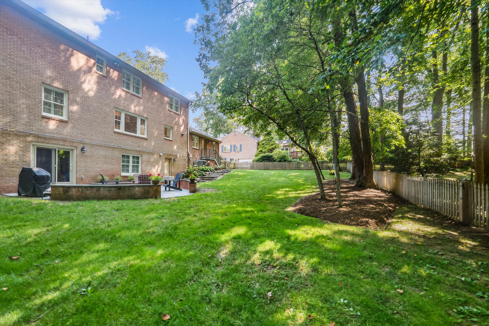 9904 Carter Road Bethesda, MD 20817 - Photo 39 of 41 a view of a yard with a house in the background