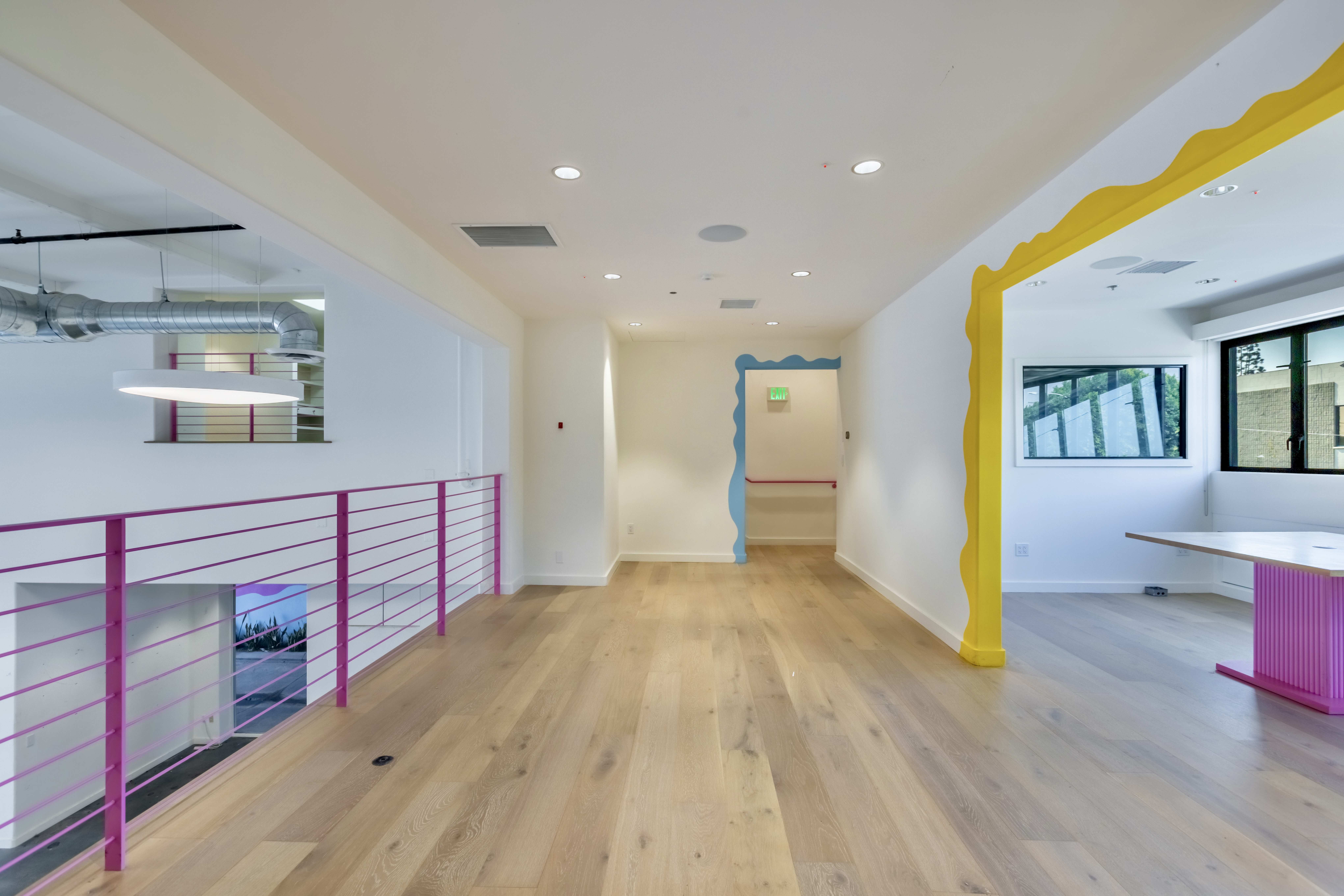 3058 North Lima Street Burbank, CA 91504 - Photo 17 of 41 a view of a bedroom with wooden floor and a bed