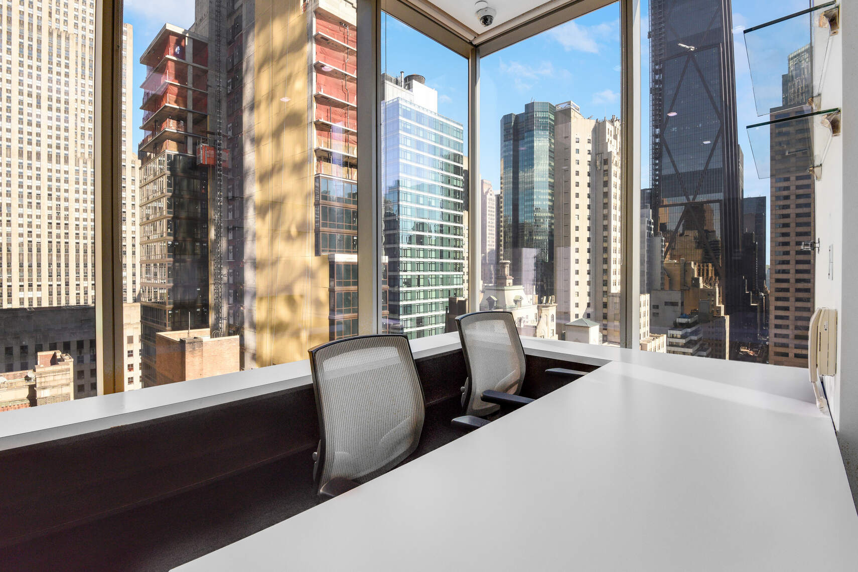 50 West 47th Street, Unit Undisclosed Manhattan, NY 10036 - Photo 18 of 27 a large room with windows