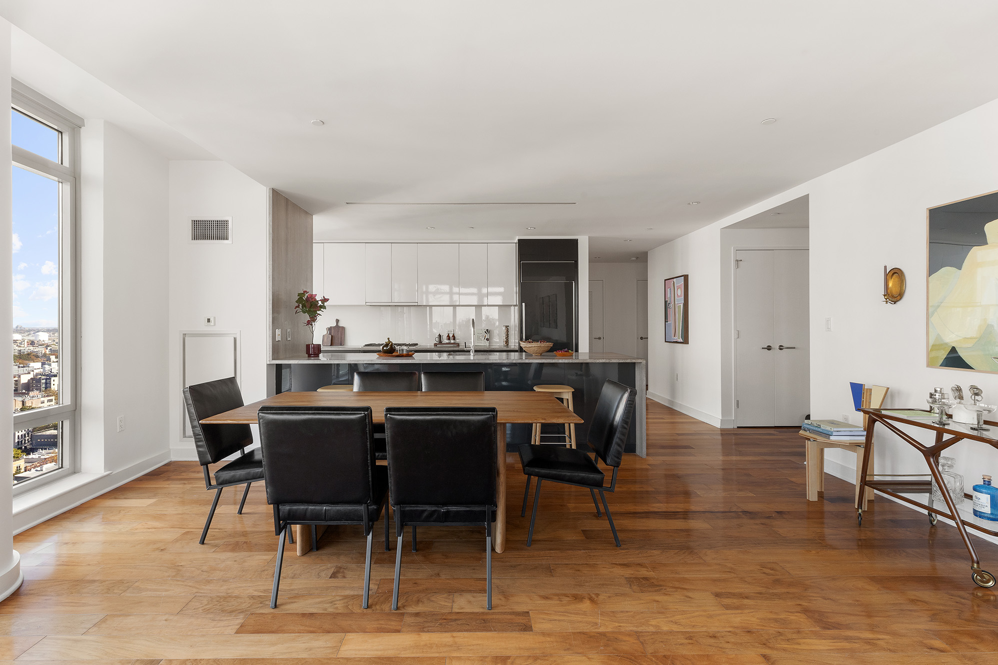 2 Northside Piers, Unit 25P Brooklyn, NY 11249 - Photo 7 of 26 a view of a dining room with furniture