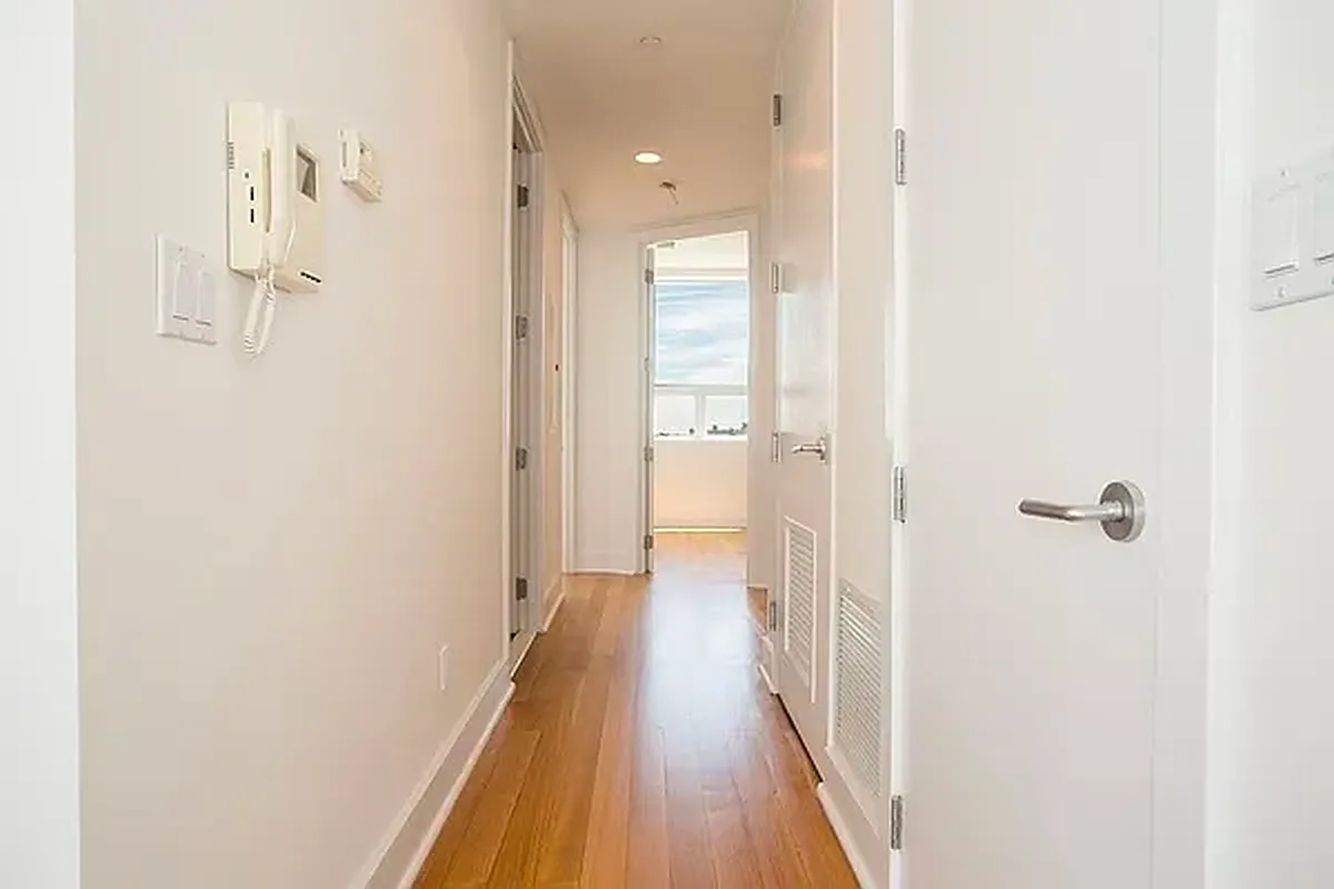 128 Newton Street, Unit 2B Brooklyn, NY 11222 - Photo 5 of 13 a view of a hallway with wooden floor