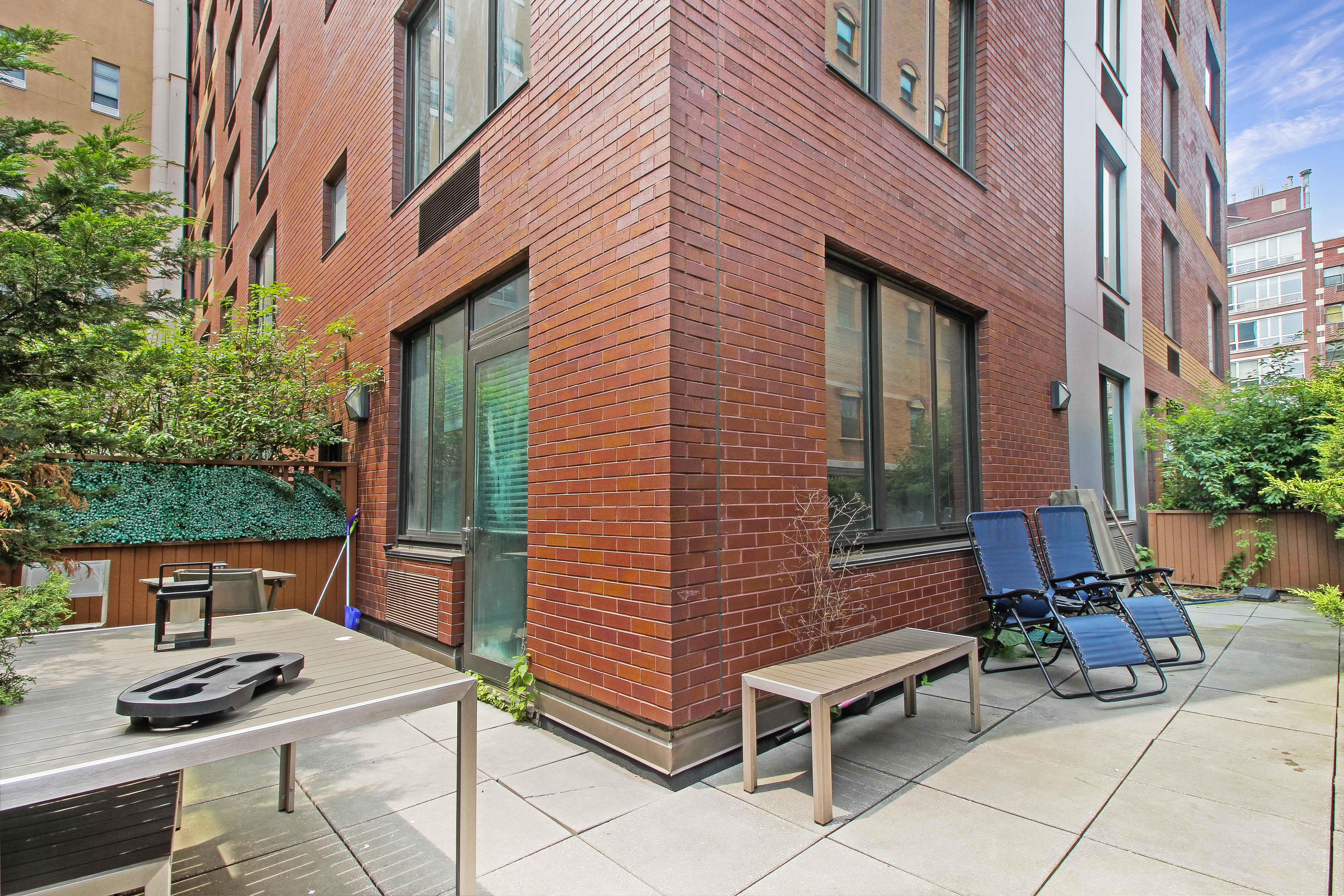 199 Bowery, Unit 2B Manhattan, NY 10002 - Photo 5 of 12 a view of backyard with outdoor seating and stairs
