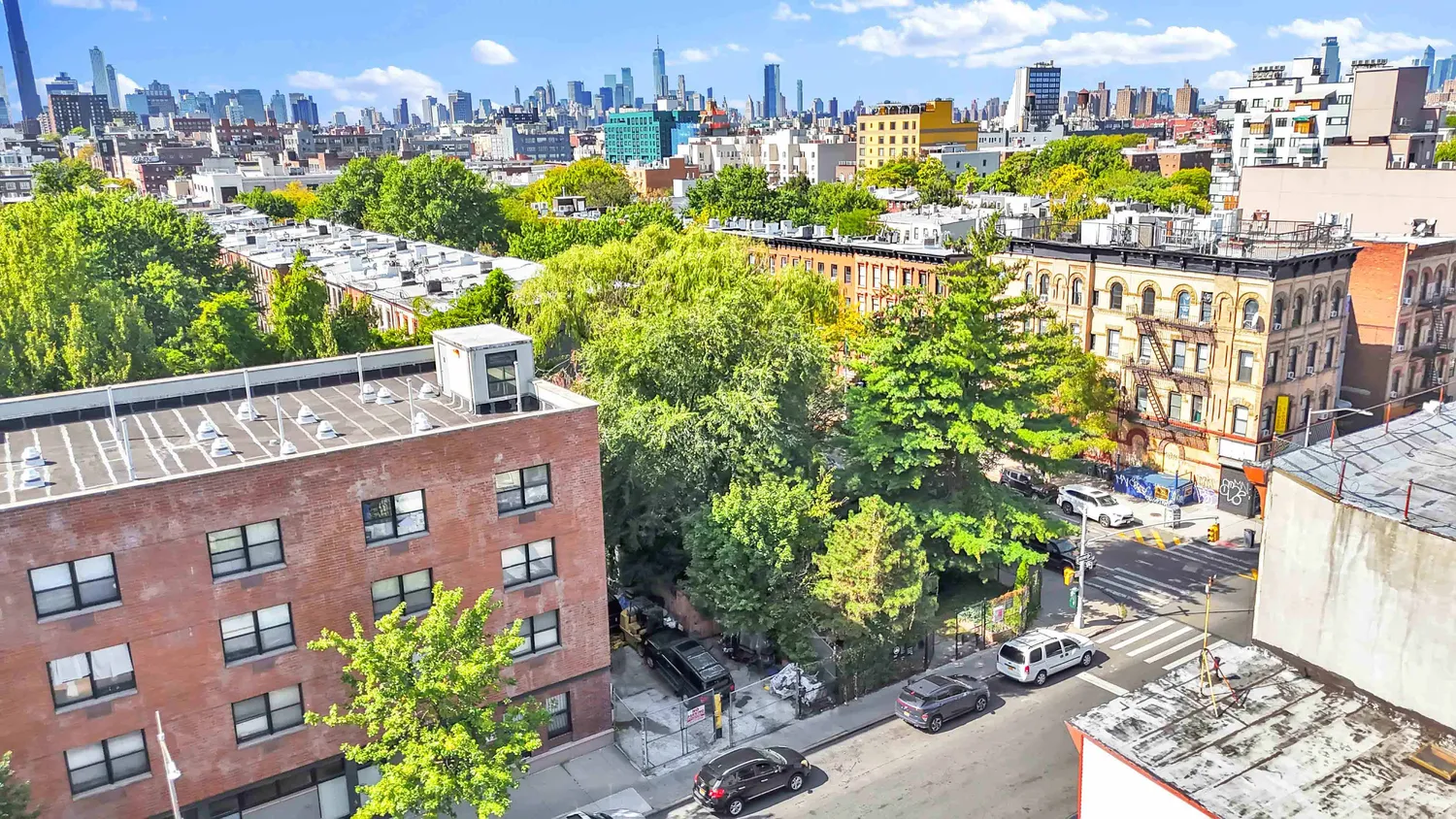 a view of a city with tall buildings