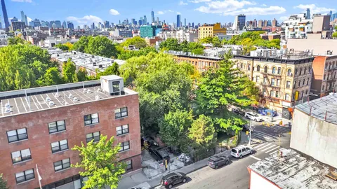 a view of a city with tall buildings