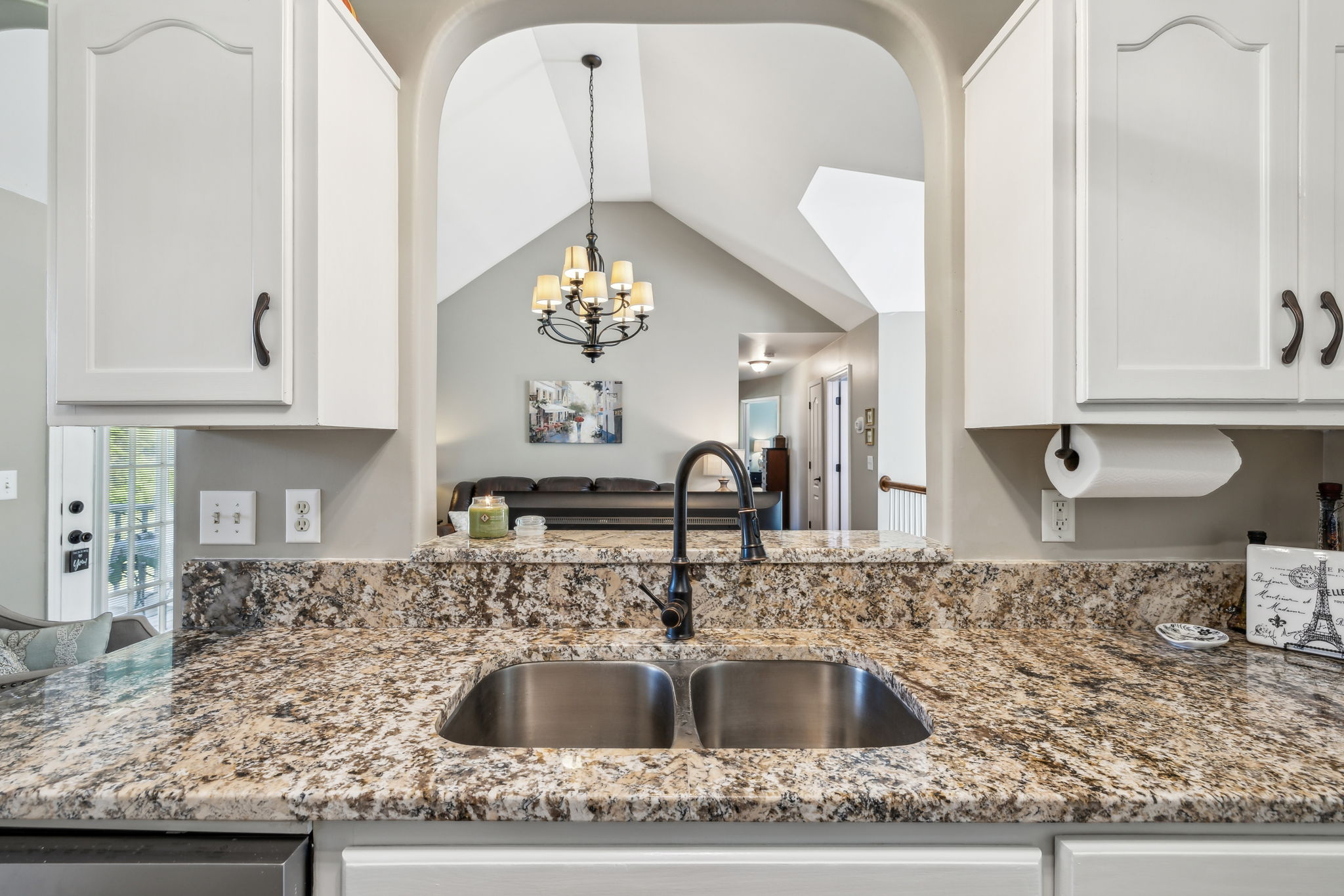 405 Billy Lane Spring Hill, TN 37174 - Photo 17 of 39 a kitchen with kitchen island granite countertop a sink and cabinets