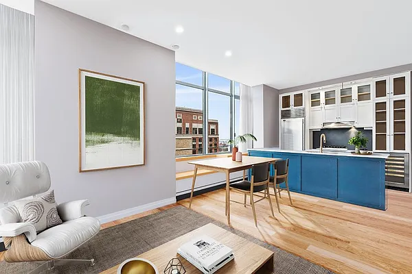 110 Livingston Street, Unit 17K Brooklyn, NY 11201 - Photo 2 of 11 a living room with furniture and a window