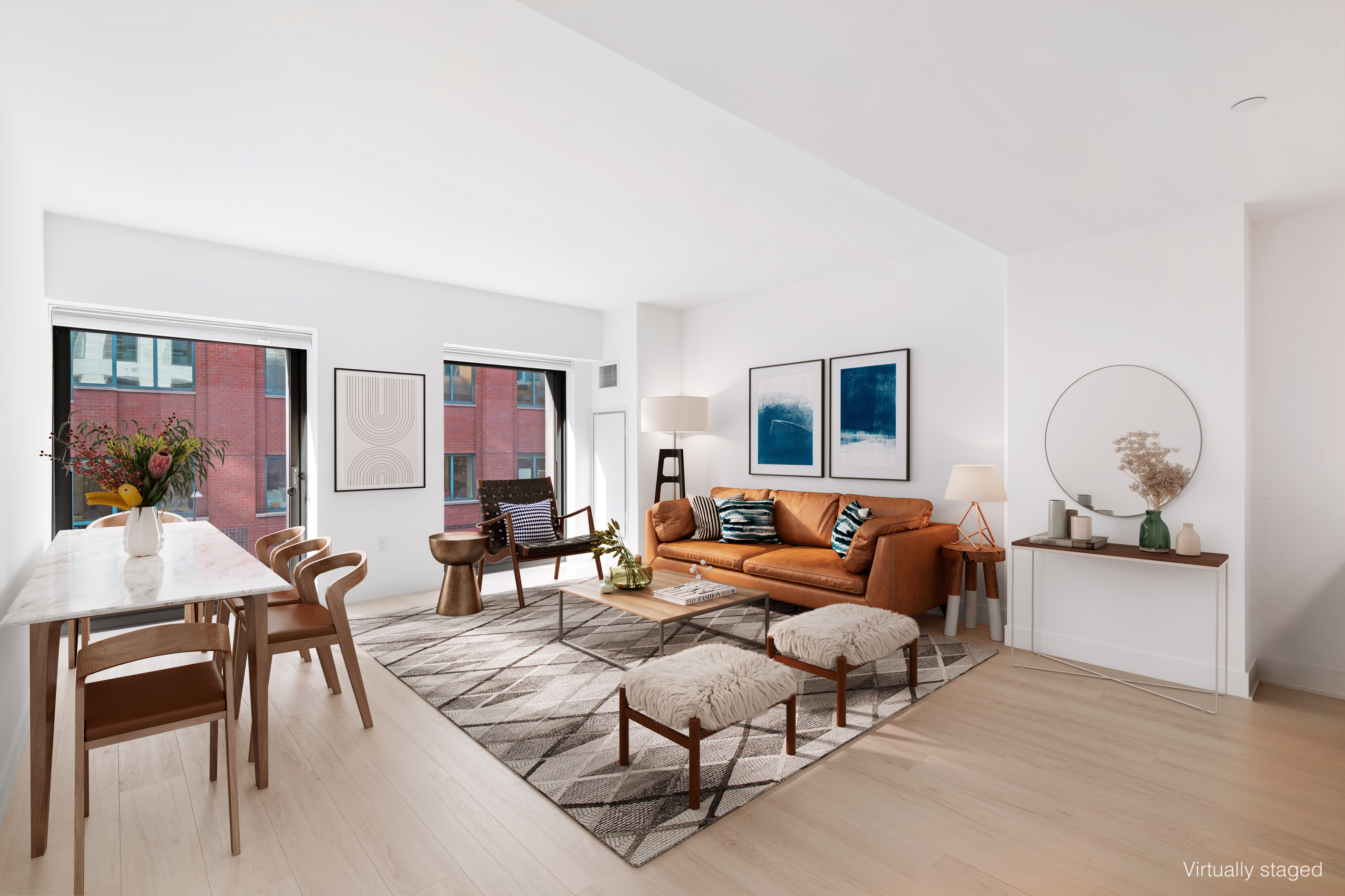 55 West 17th Street, Unit 403 Manhattan, NY 10011 - Photo 1 of 8 a living room with furniture and wooden floor