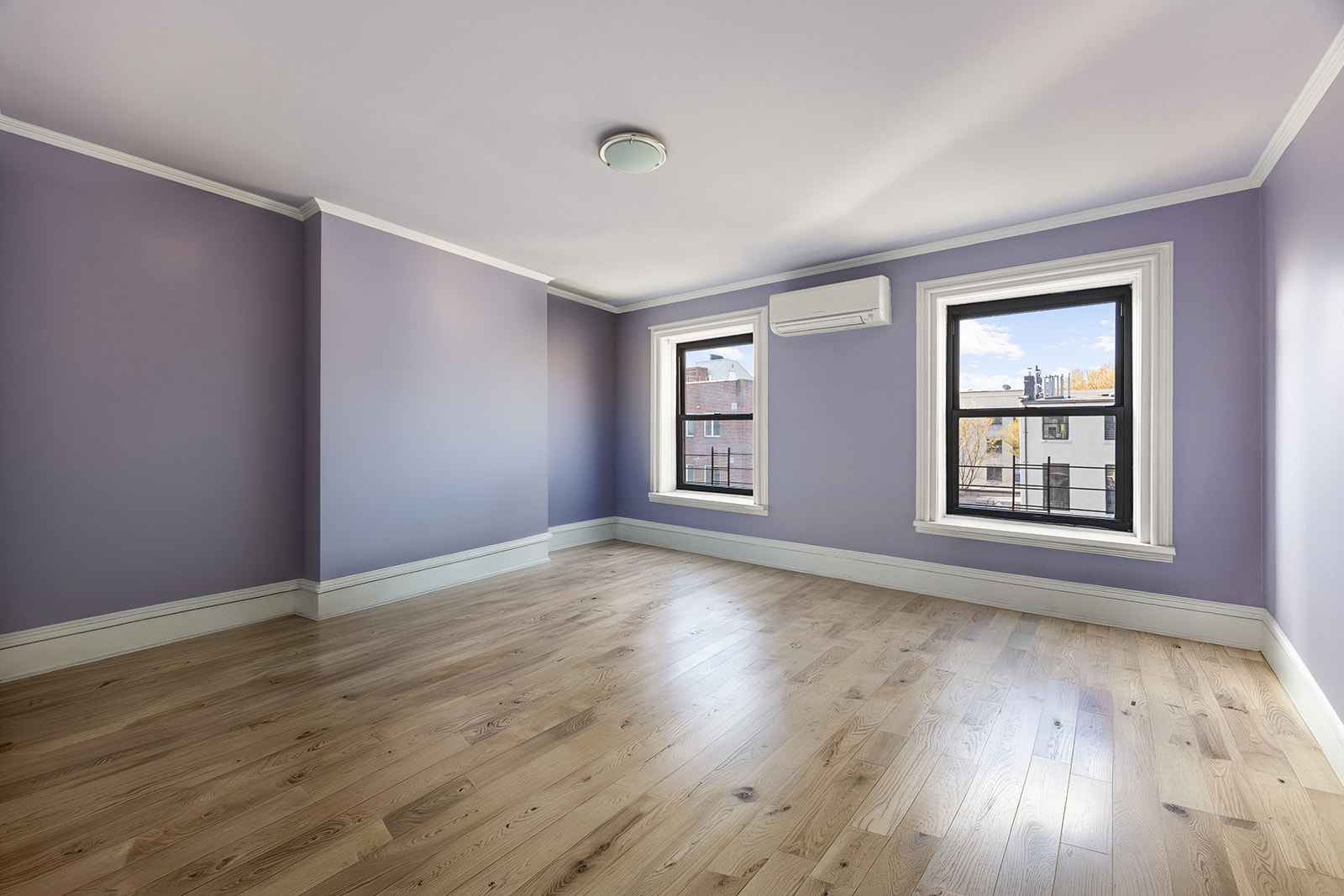50 Wyckoff Street, Unit 2 Brooklyn, NY 11201 - Photo 11 of 14 a view of an empty room with wooden floor and a window