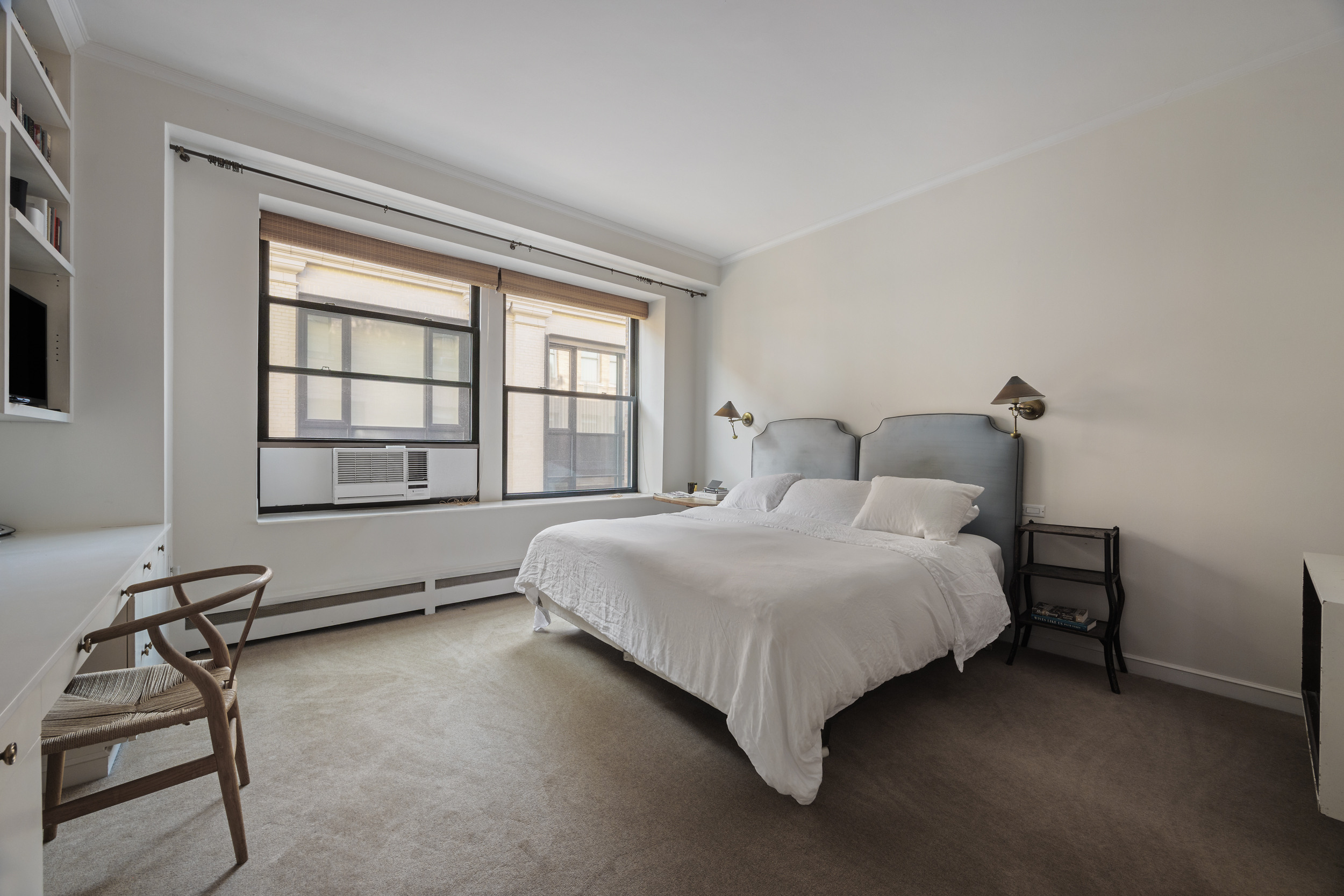 260 West Broadway, Unit 10D Manhattan, NY 10013 - Photo 11 of 20 a bedroom with a bed chair and window