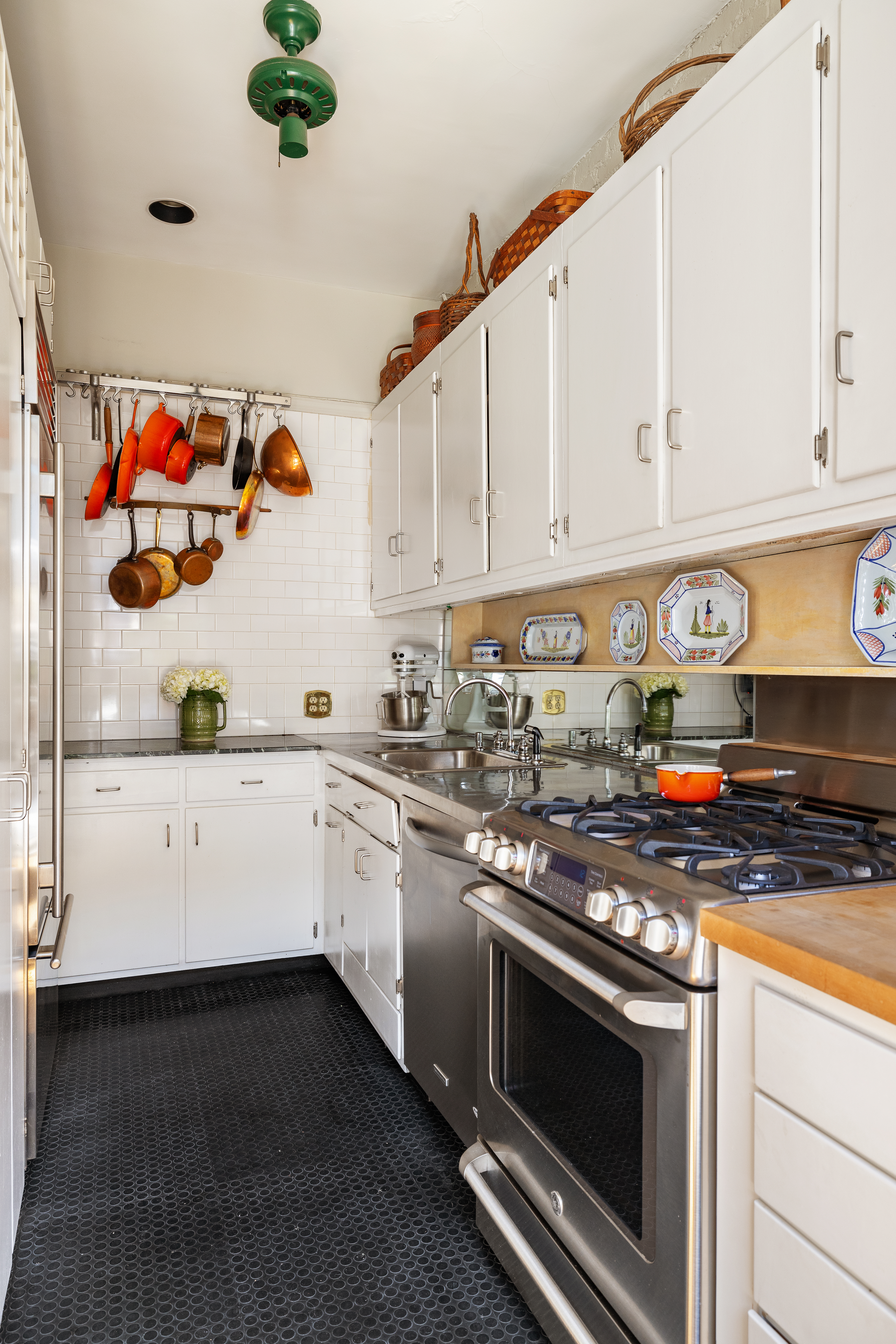 26 Pierrepont Street, Unit 2 Brooklyn, NY 11201 - Photo 8 of 21 a kitchen with stainless steel appliances granite countertop a stove a sink and white cabinets