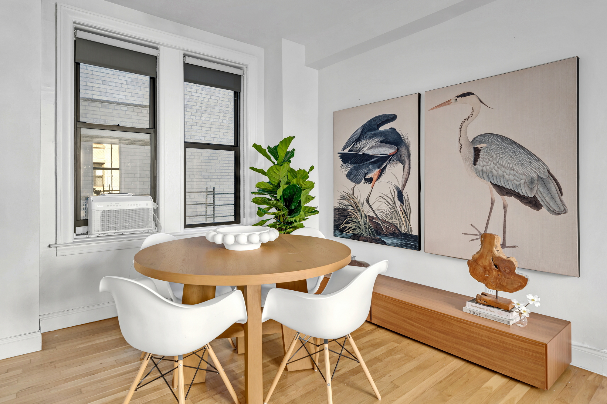 599 West End Avenue, Unit 7BC Manhattan, NY 10024 - Photo 4 of 11 a dining room with furniture and wooden floor