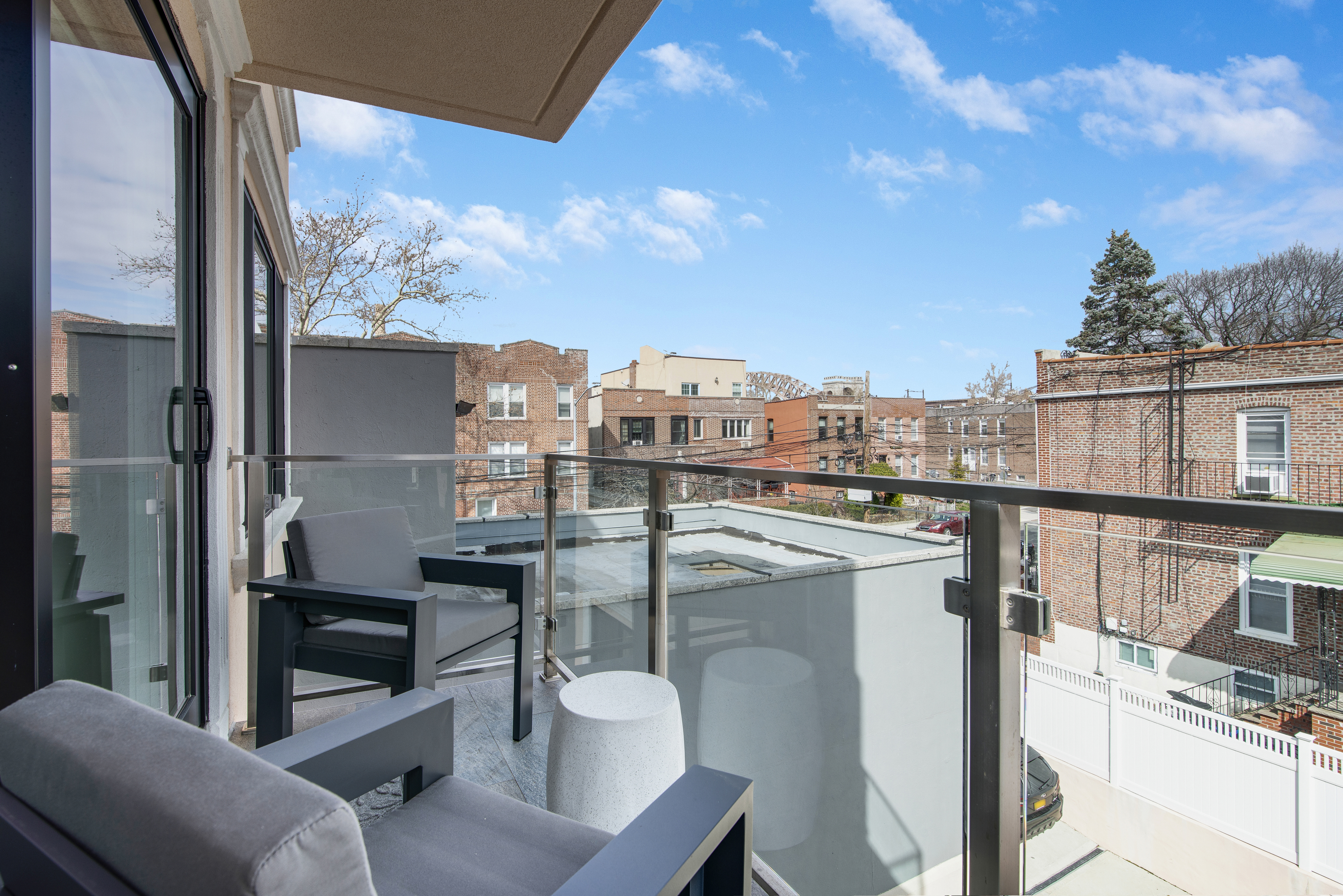 23-05 24th Avenue, Unit 3B Queens, NY 11102 - Photo 8 of 10 a view of city from balcony