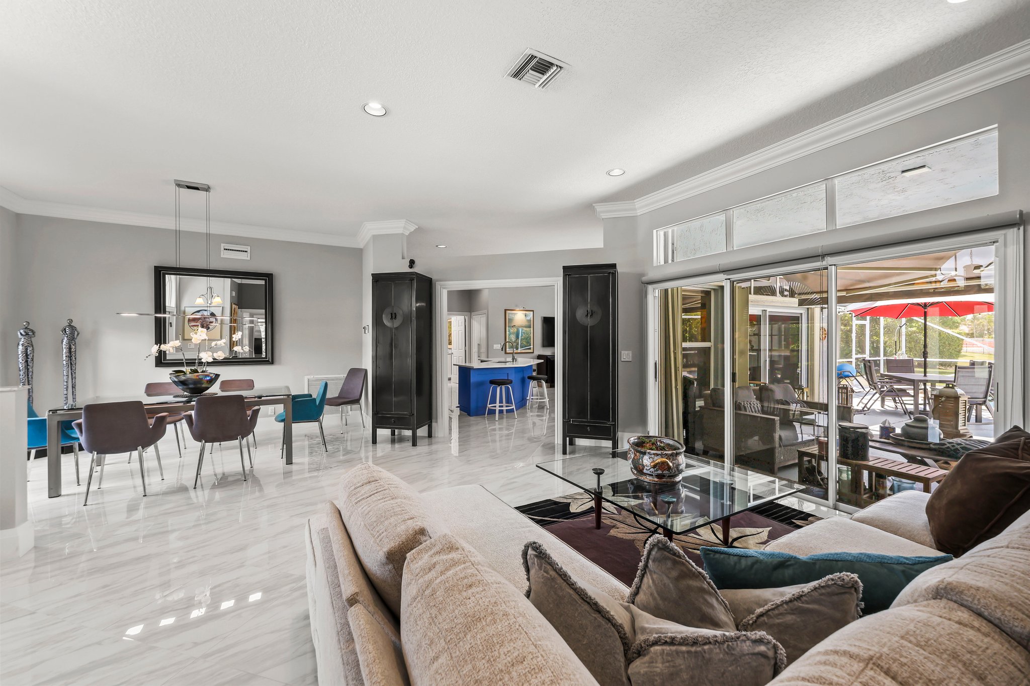 20317 Hacienda Court Boca Raton, FL 33498 - Photo 11 of 100 a living room with furniture and large windows