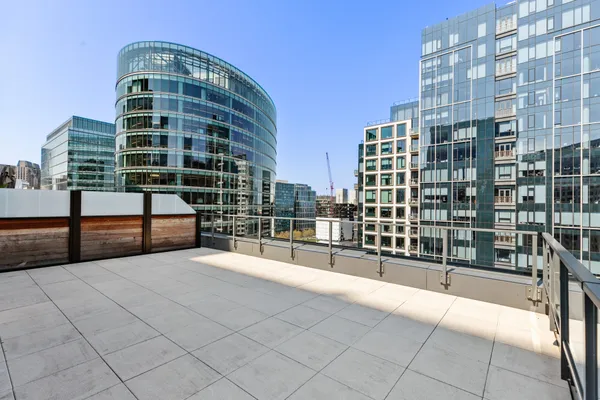 a view of a building with a floor to ceiling window