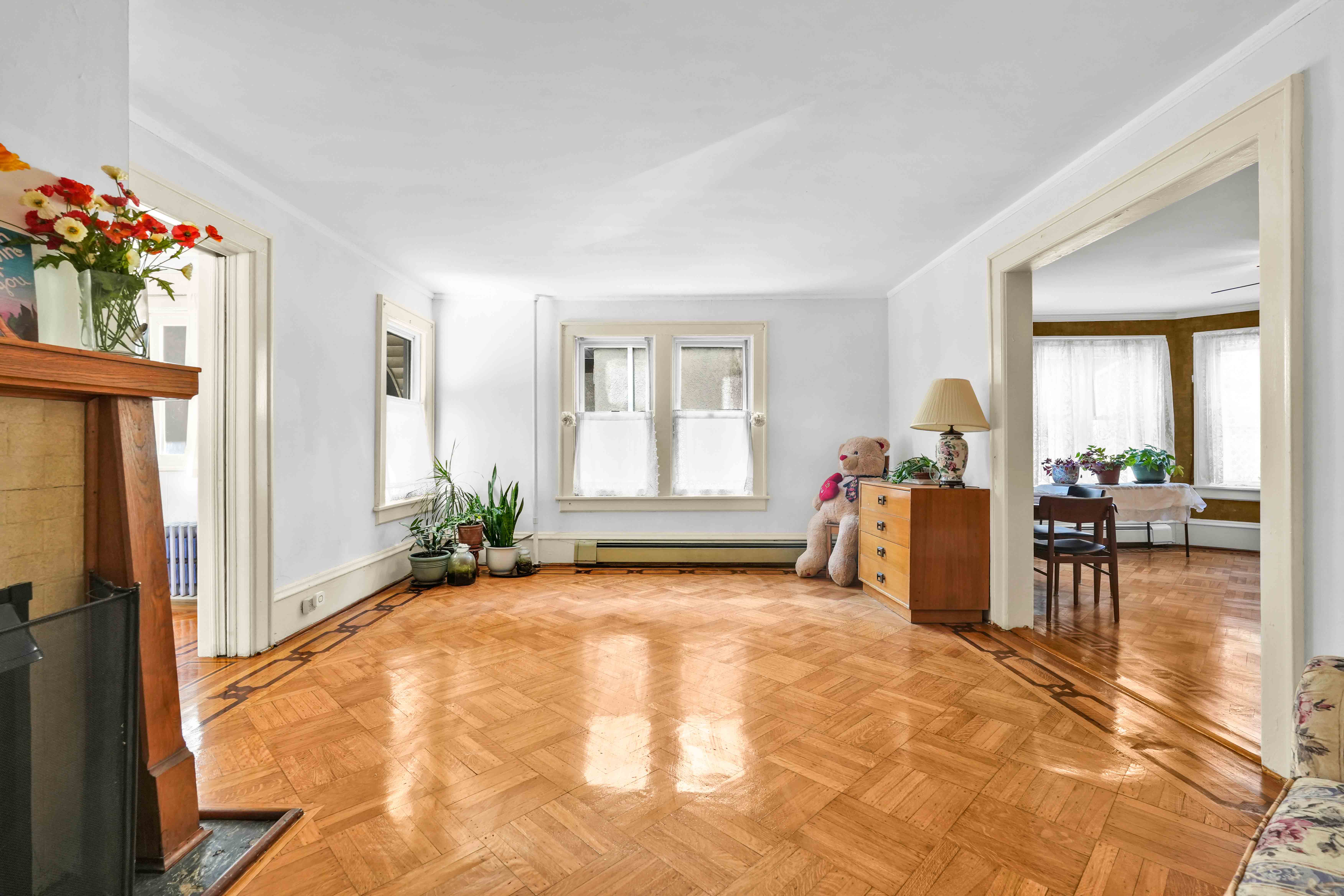 642 East 26th Street Brooklyn, NY 11210 - Photo 6 of 32 a view of a livingroom with furniture and a yard