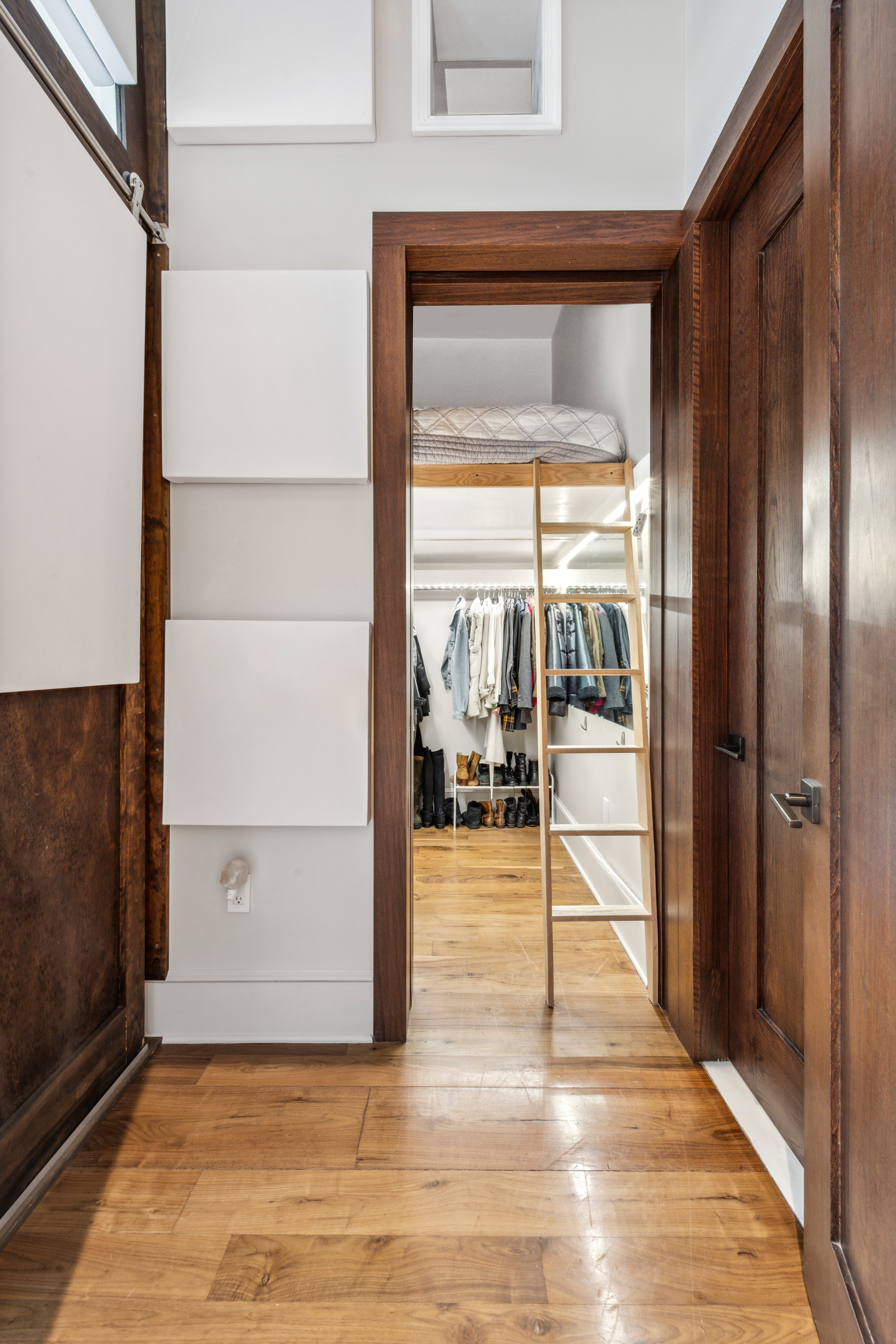 520 West 45th Street, Unit 4D Manhattan, NY 10036 - Photo 6 of 14 a view of a livingroom with wooden floor and a fireplace