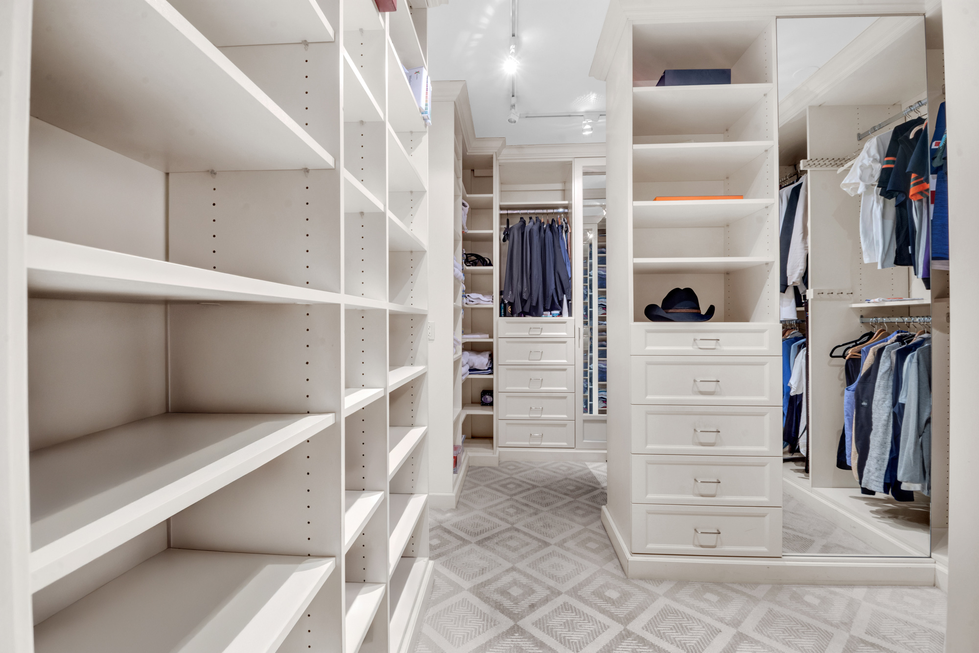 150 East 69th Street, Unit 6Q Manhattan, NY 10021 - Photo 14 of 15 a view of walk in closet with clothes and shoes