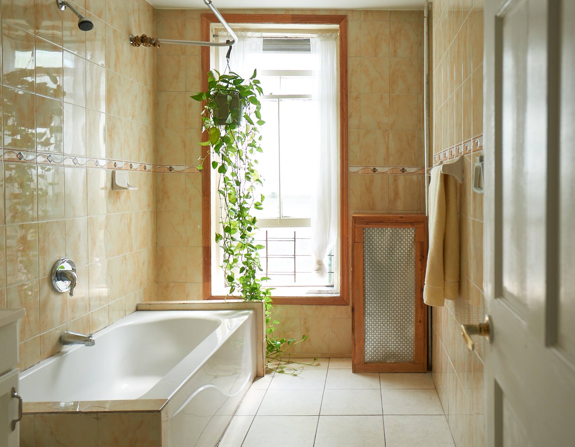 660 Macon Street Brooklyn, NY 11233 - Photo 10 of 17 a bathroom with a tub and shower