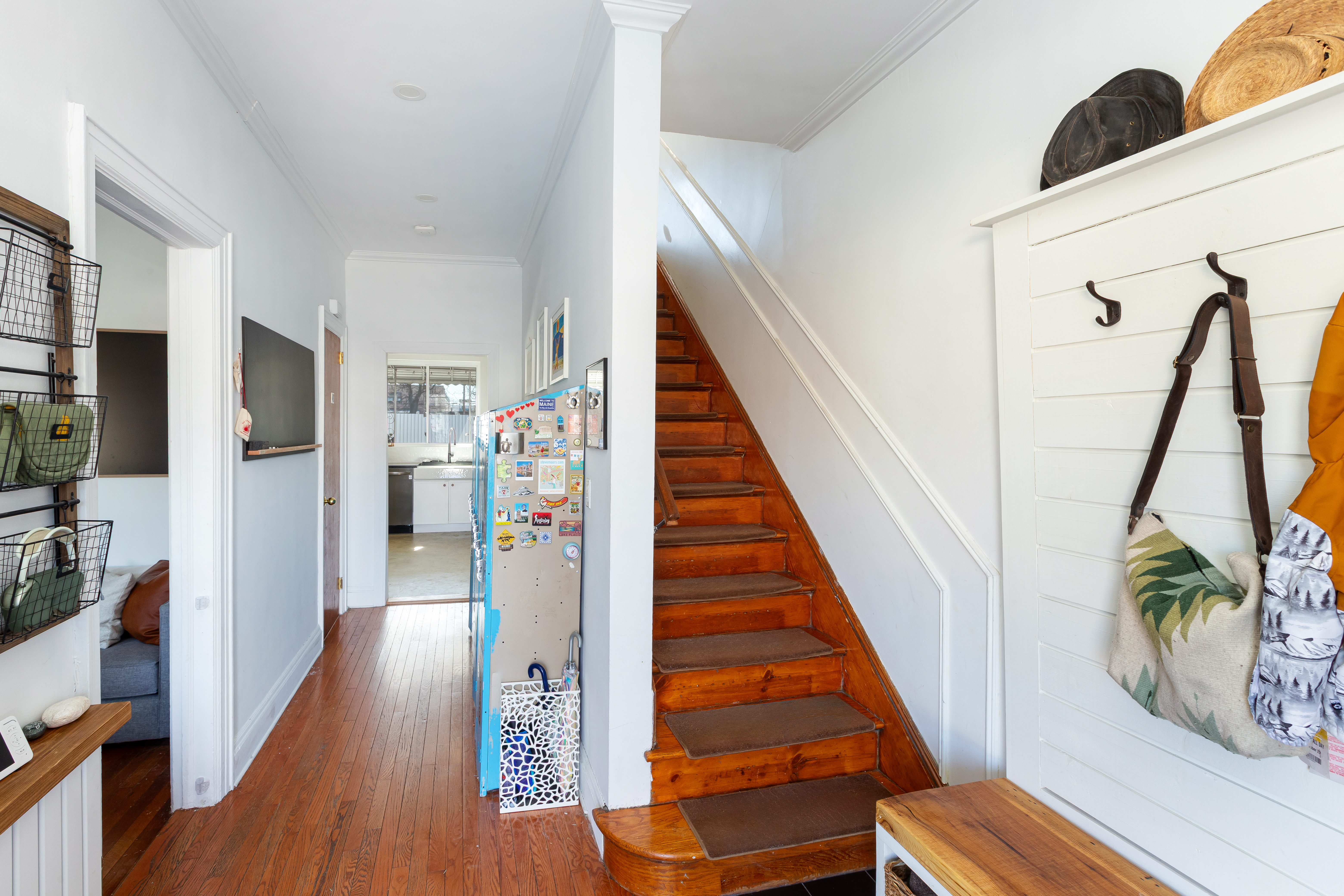 214 Eagle Street Brooklyn, NY 11222 - Photo 8 of 22 a view of a hallway with wooden floor and staircase