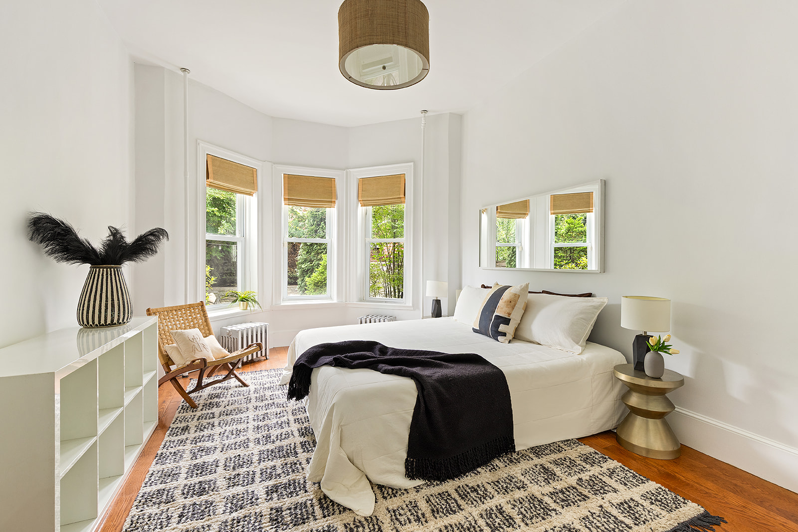 203 Lefferts Avenue Brooklyn, NY 11225 - Photo 8 of 12 a bedroom with a bed and a window