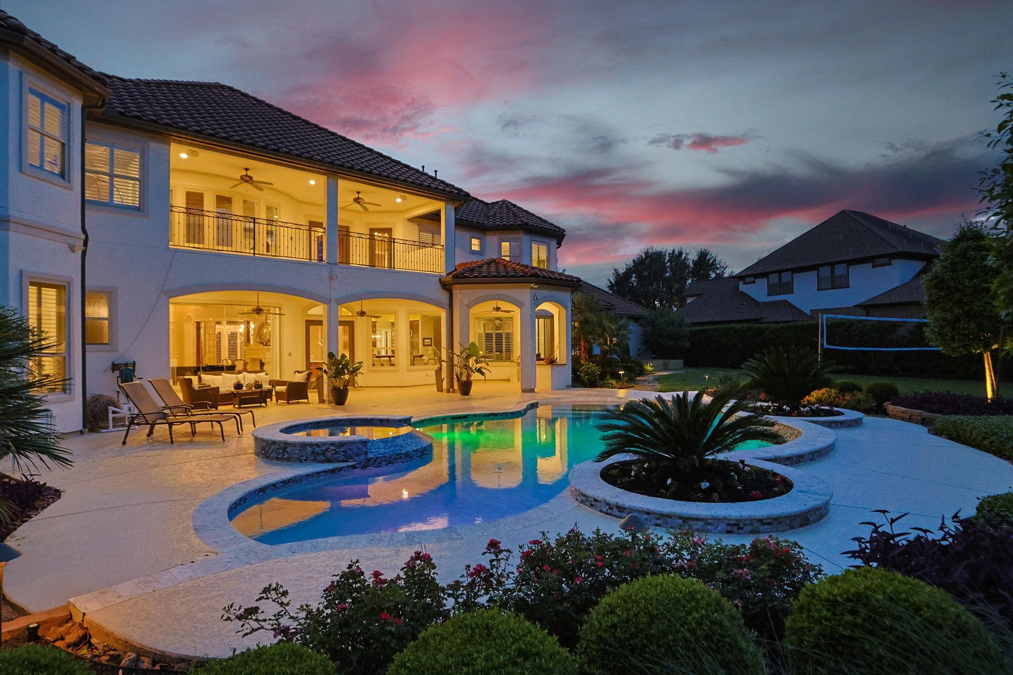 82 Manor Lake Estates Circle Spring, TX 77379 - Photo 51 of 52 a front view of a house with garden and patio