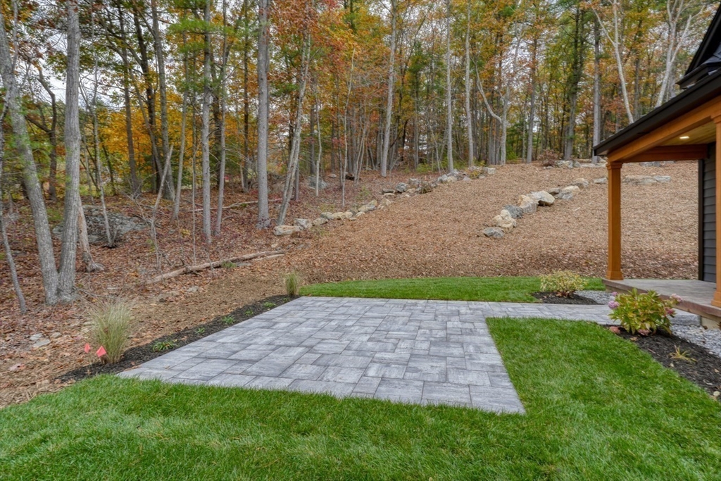 171 Randall Road Berlin, MA 01503 - Photo 36 of 41 a view of a backyard with large trees