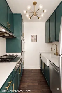 a kitchen with stainless steel appliances granite countertop a sink stove and cabinets