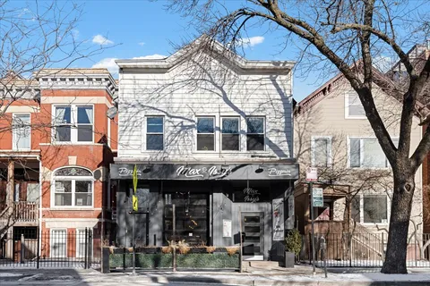 a view of a building with a street