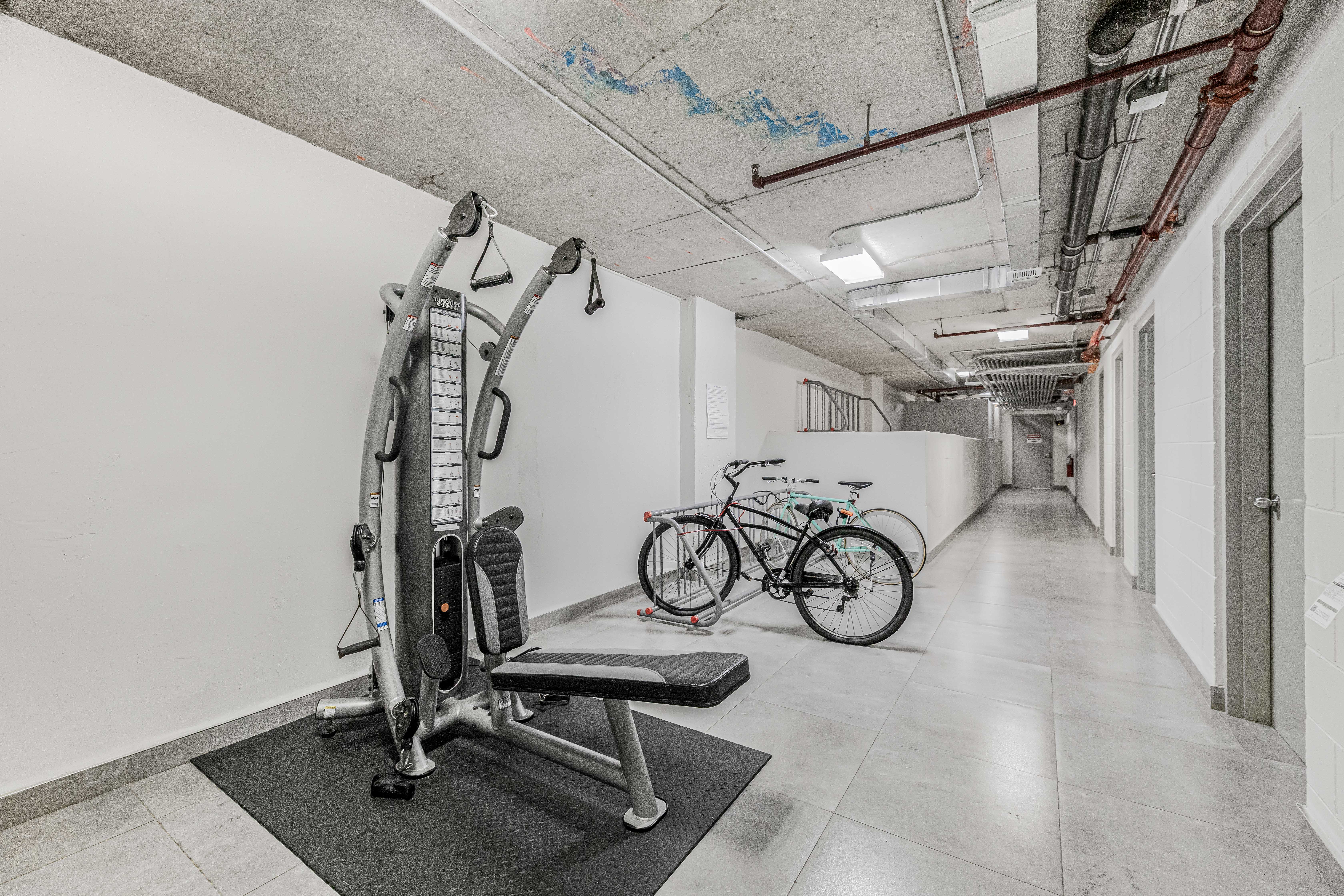 42-50 27th Street, Unit 9C Queens, NY 11101 - Photo 24 of 32 a view of storage and utility room with racks on the wall