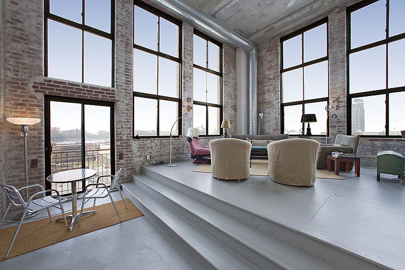 a room with lots of table and chairs