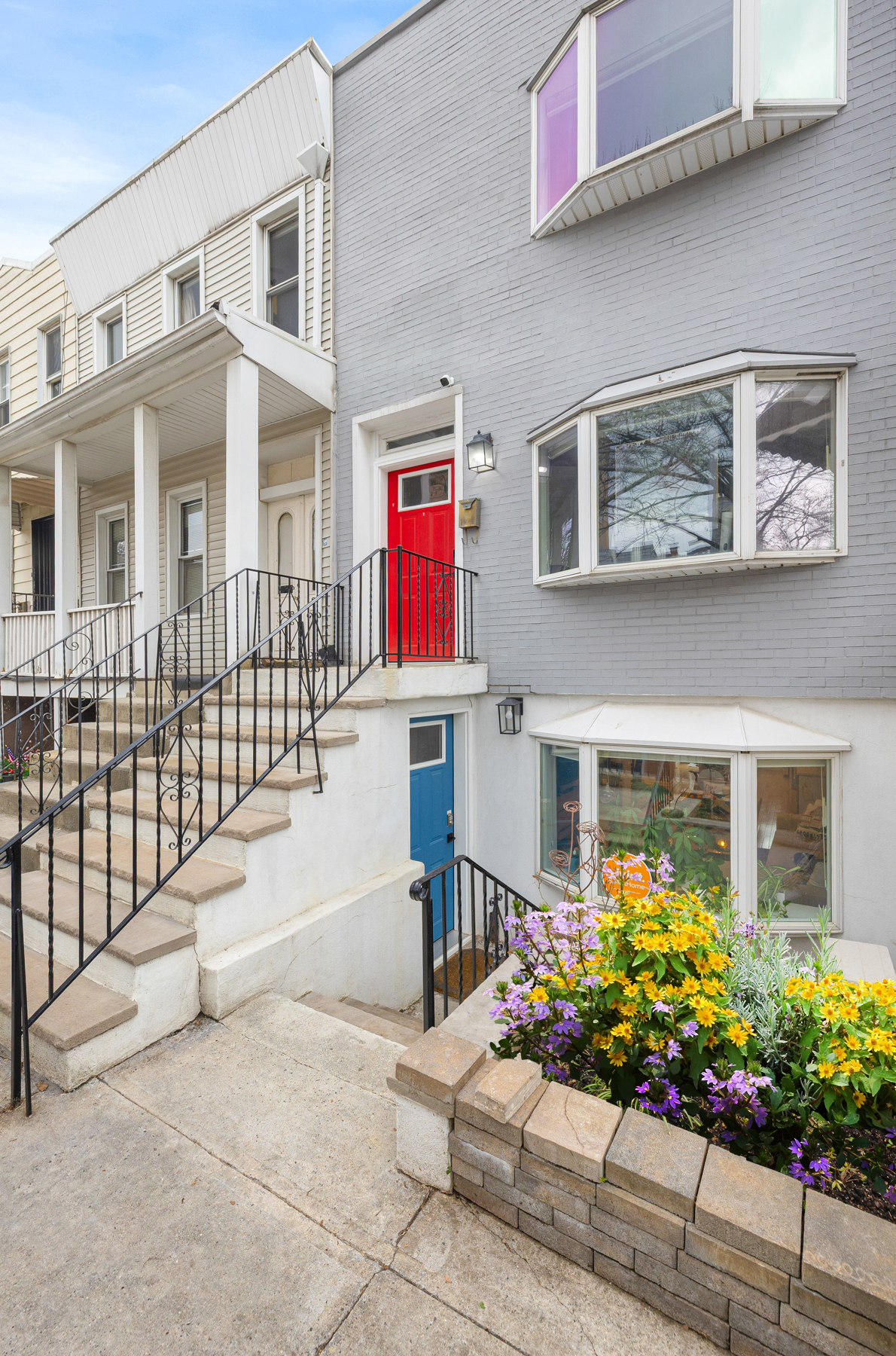 202 22nd Street Brooklyn, NY 11232 - Photo 26 of 28 a building with potted plant in front of it