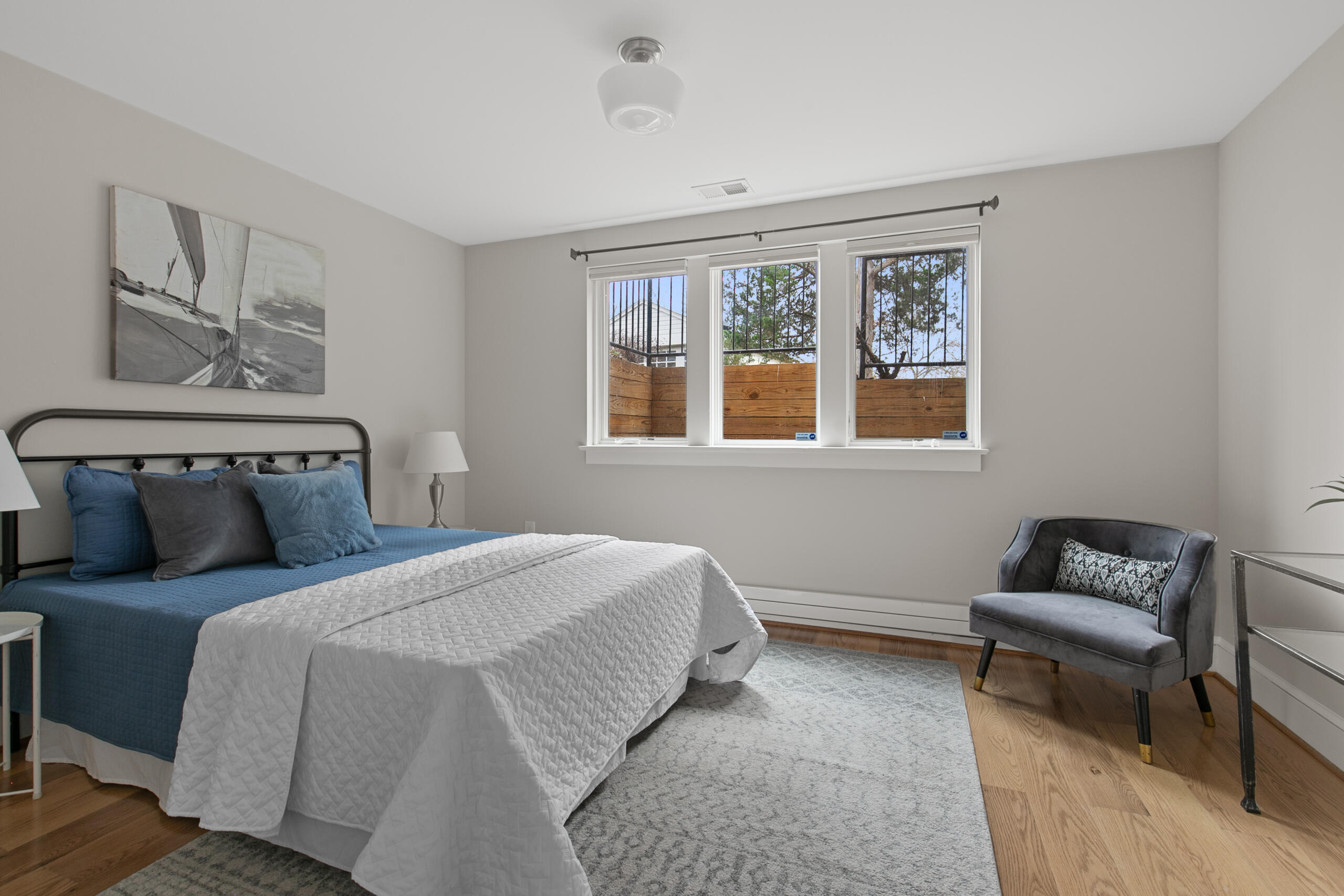 1908 Glen Ross Road Silver Spring, MD 20910 - Photo 43 of 63 a bedroom with a bed and wooden floor