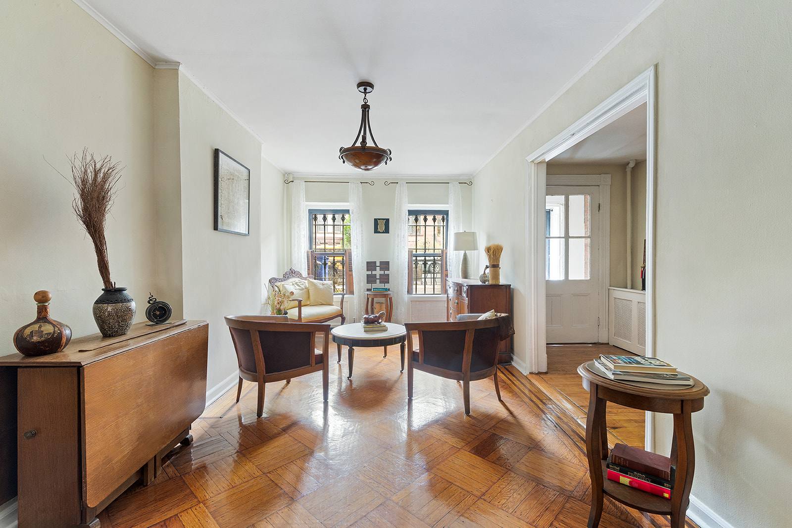 156 Bainbridge Street Brooklyn, NY 11233 - Photo 4 of 14 a living room with furniture a piano and a window
