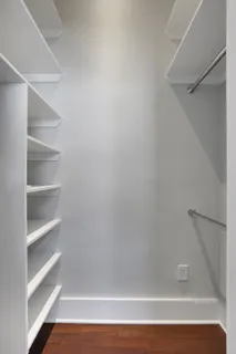 a view of a room with racks on the wall