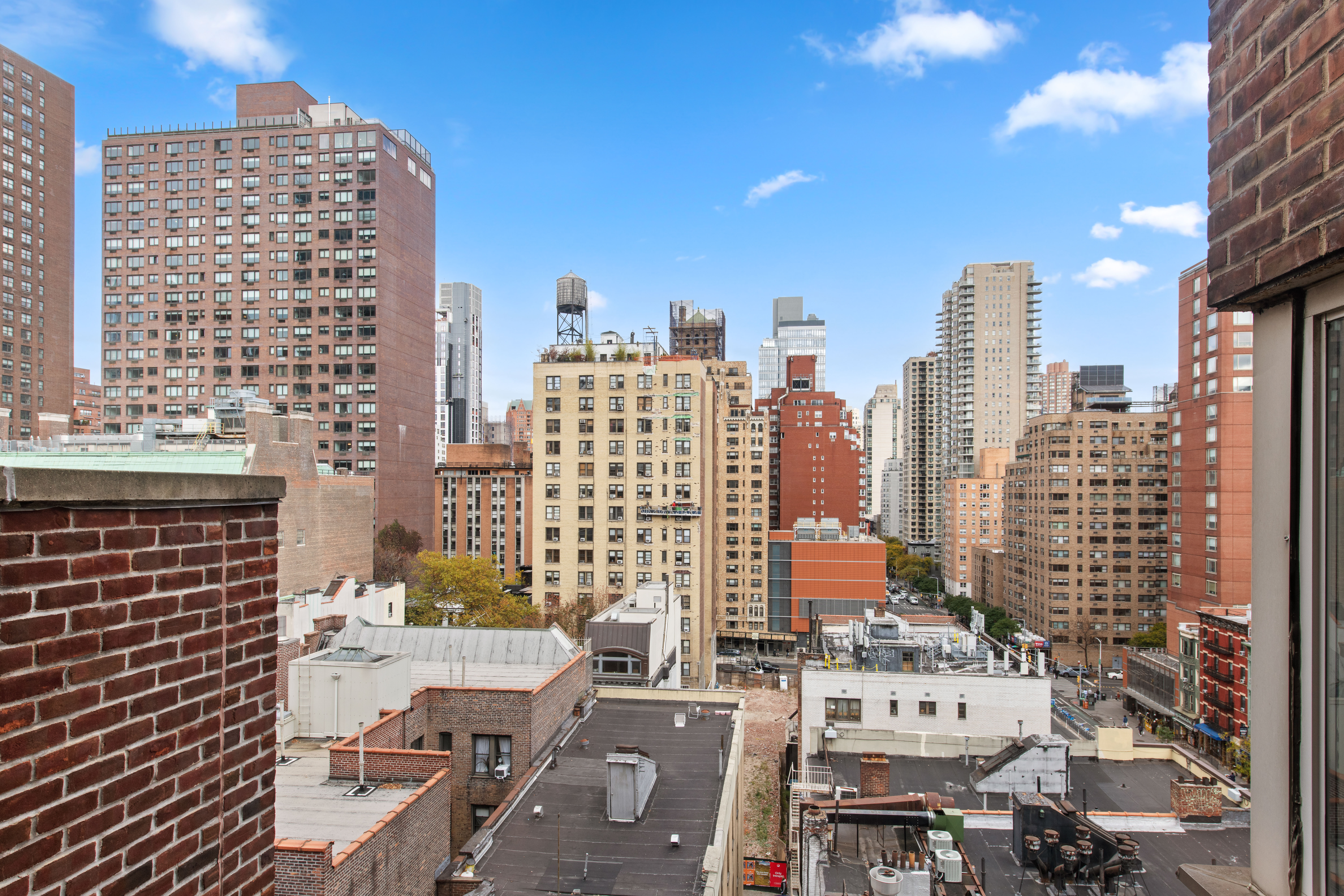 233 East 70th Street, Unit 11P Manhattan, NY 10021 - Photo 10 of 15 a view of a city with tall buildings
