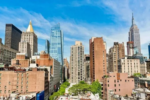 a city view with tall buildings