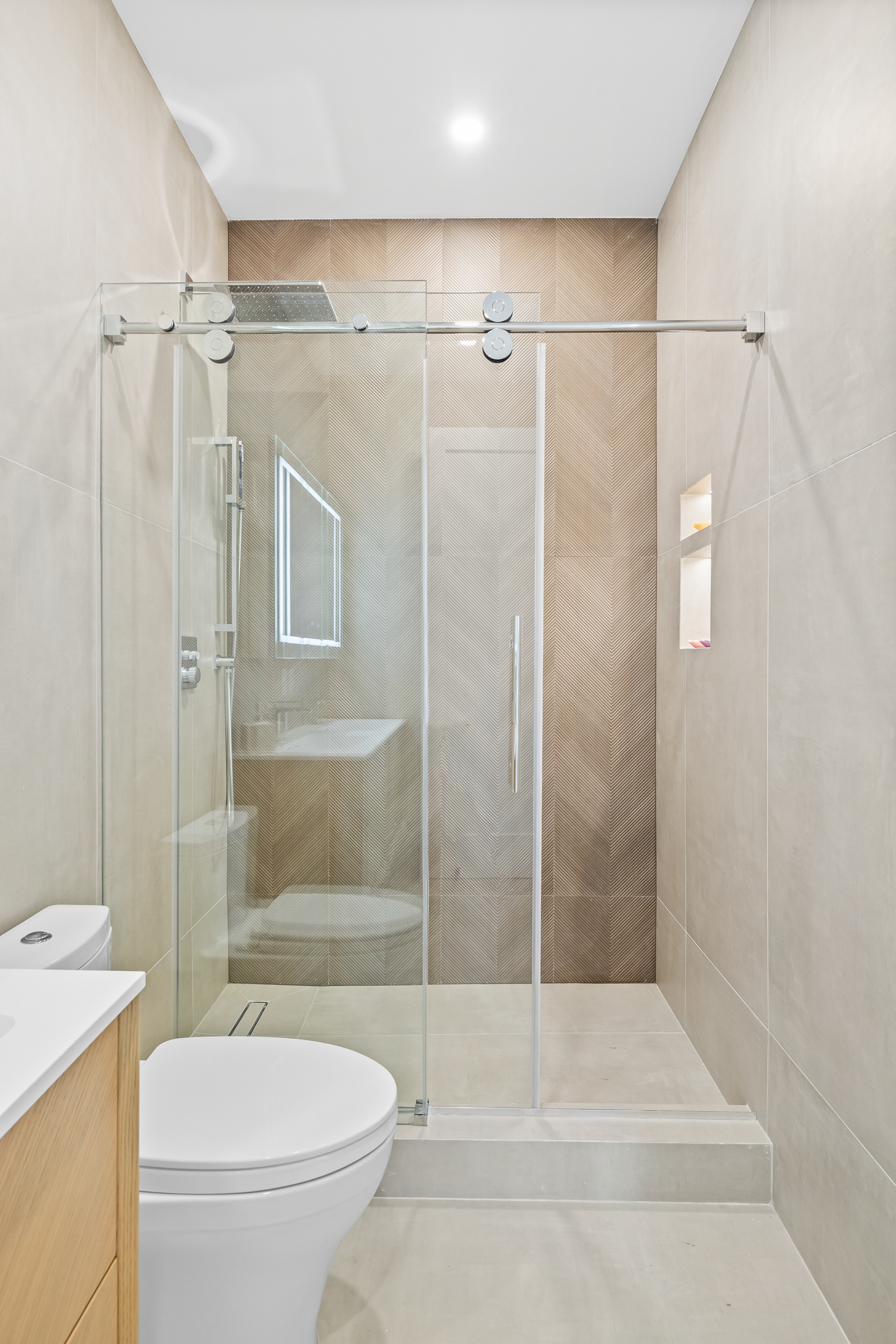 247 18th Street, Unit 1 Brooklyn, NY 11215 - Photo 5 of 10 a bathroom with a shower and a toilet