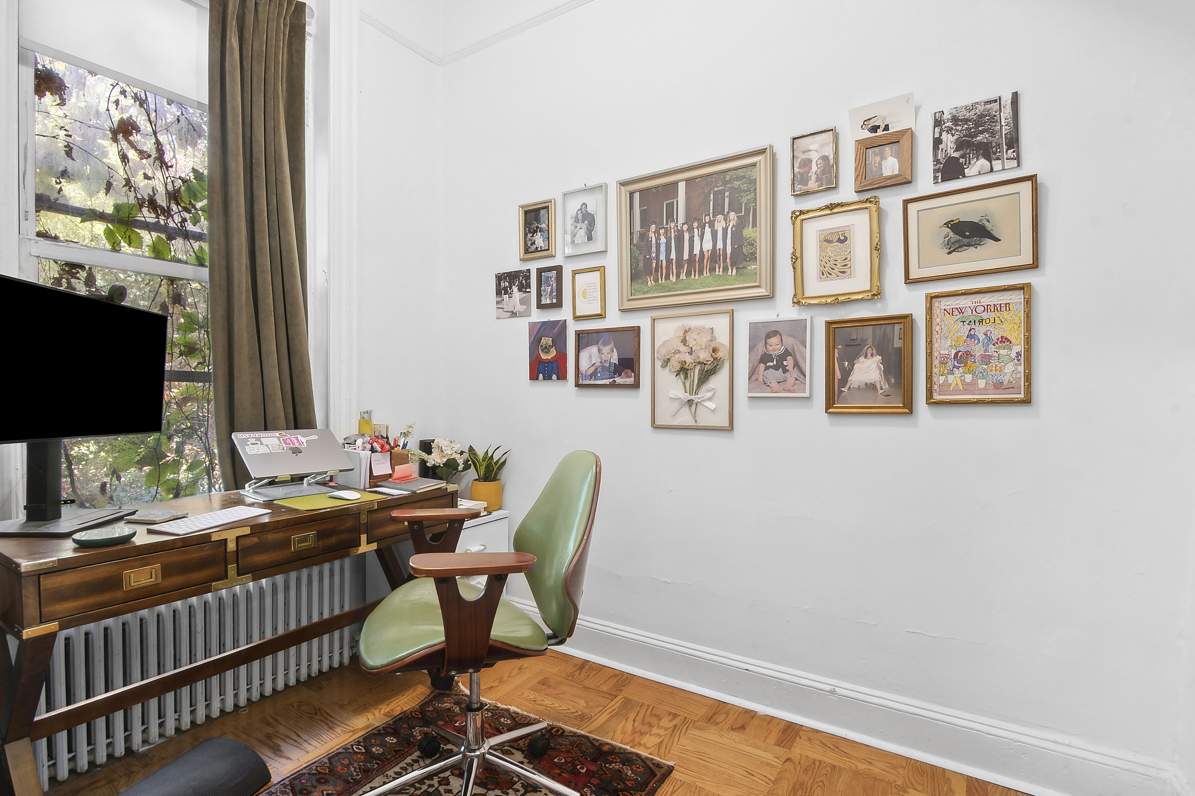 245 Baltic Street, Unit 1 Brooklyn, NY 11201 - Photo 4 of 7 a room with furniture a flat screen tv and a window