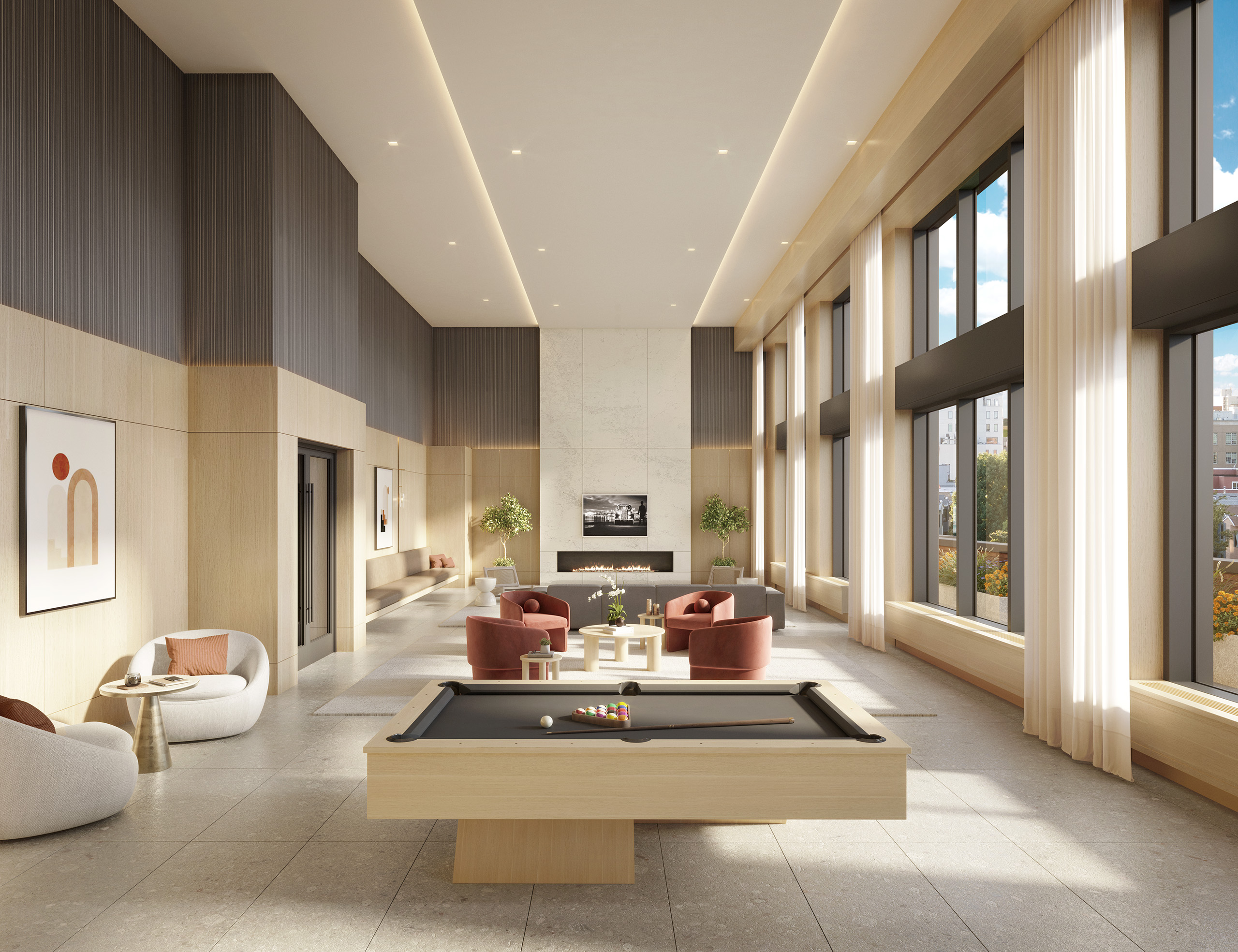 a living room with furniture and large windows