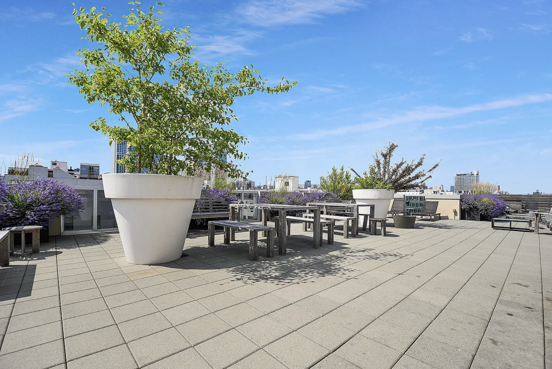 250 Bedford Avenue, Unit 308 Brooklyn, NY 11249 - Photo 6 of 8 a view of a terrace with furniture