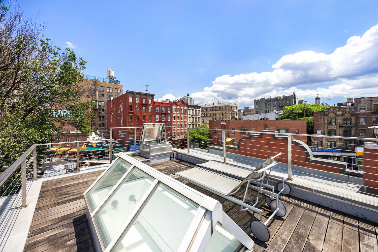 a view of a balcony with city view