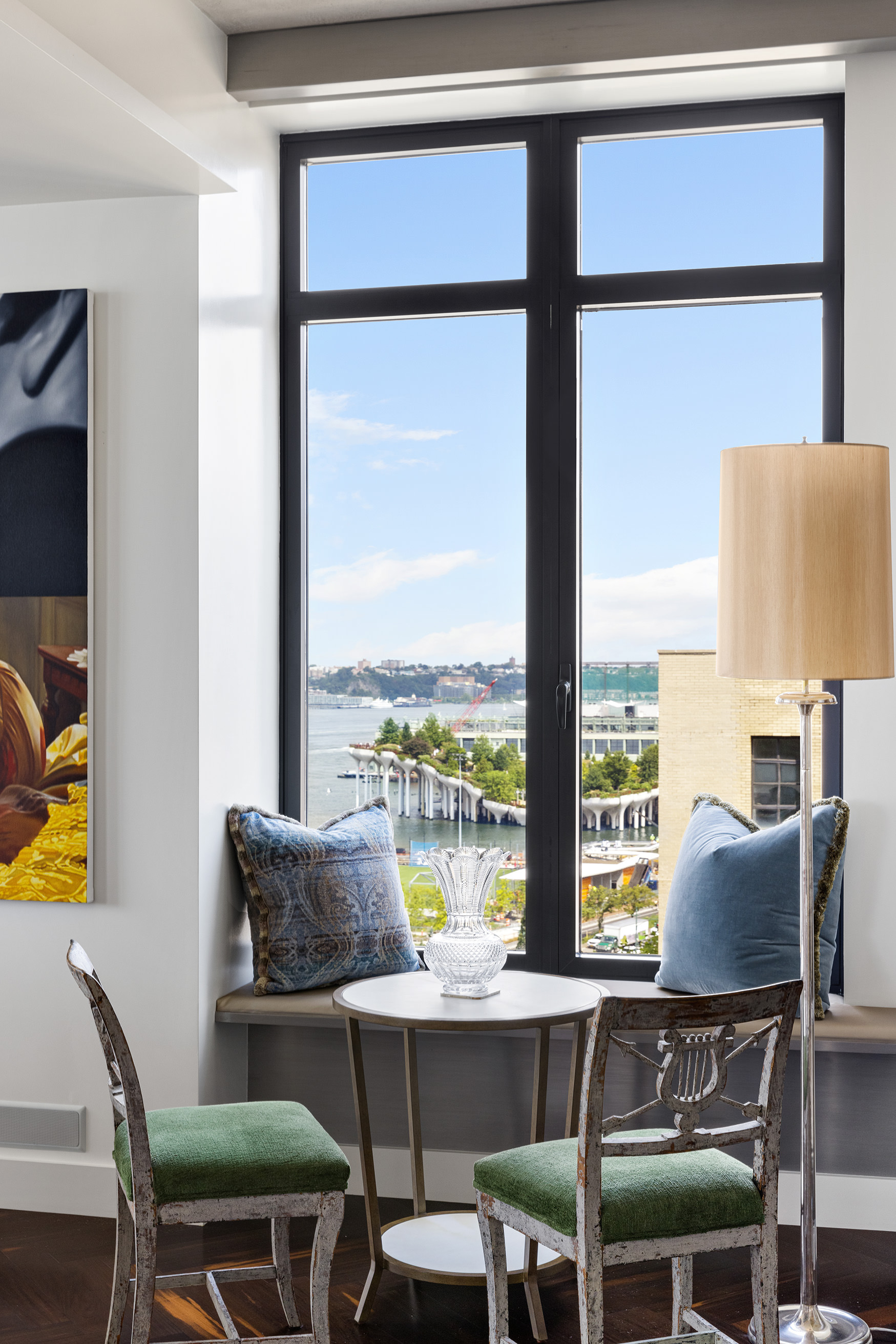 400 West 12th Street, Unit 12C Manhattan, NY 10014 - Photo 8 of 24 a dining room with furniture and a floor to ceiling window