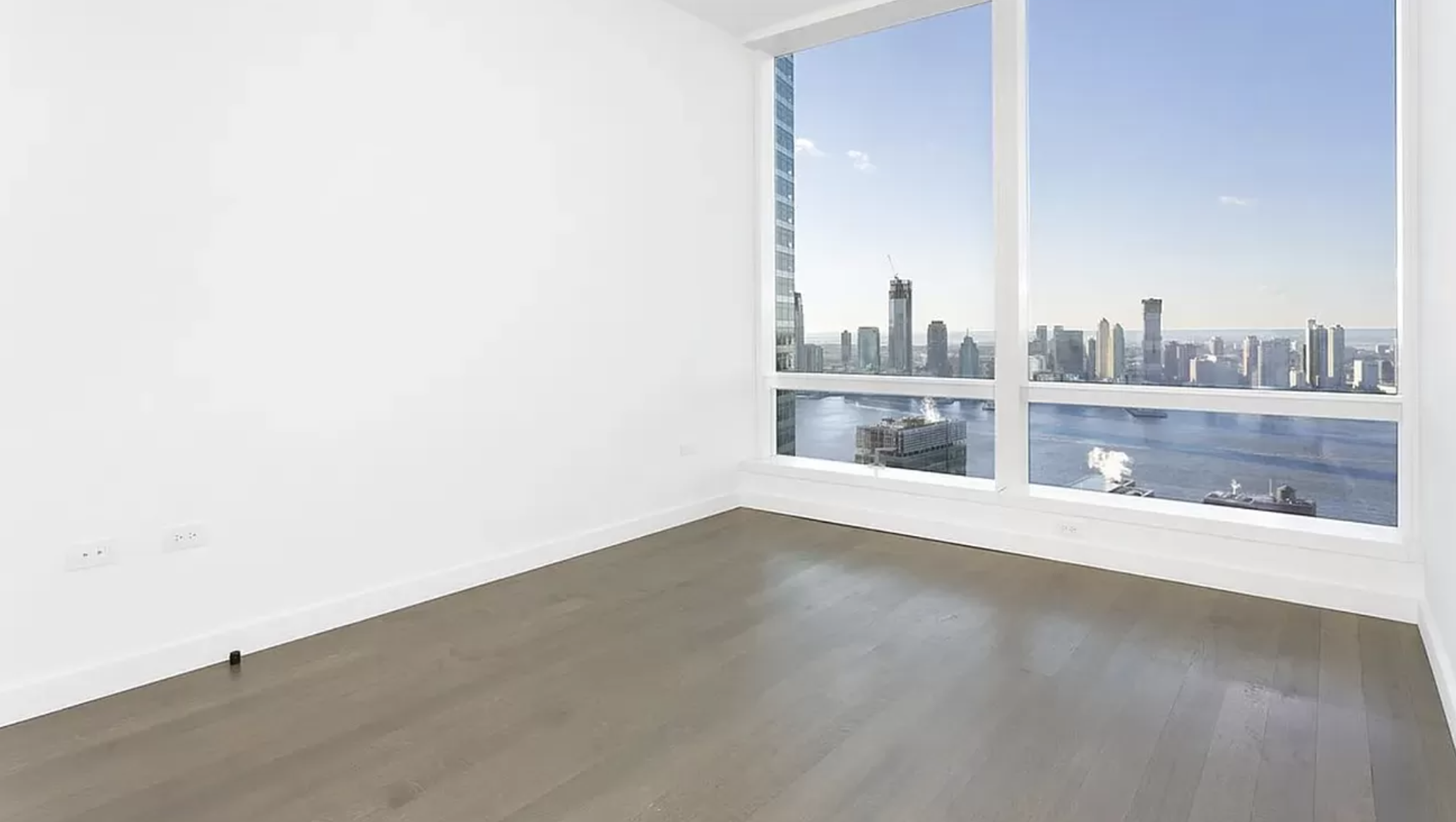 111 Murray Street, Unit 43W Manhattan, NY 10007 - Photo 9 of 32 an empty room with a window