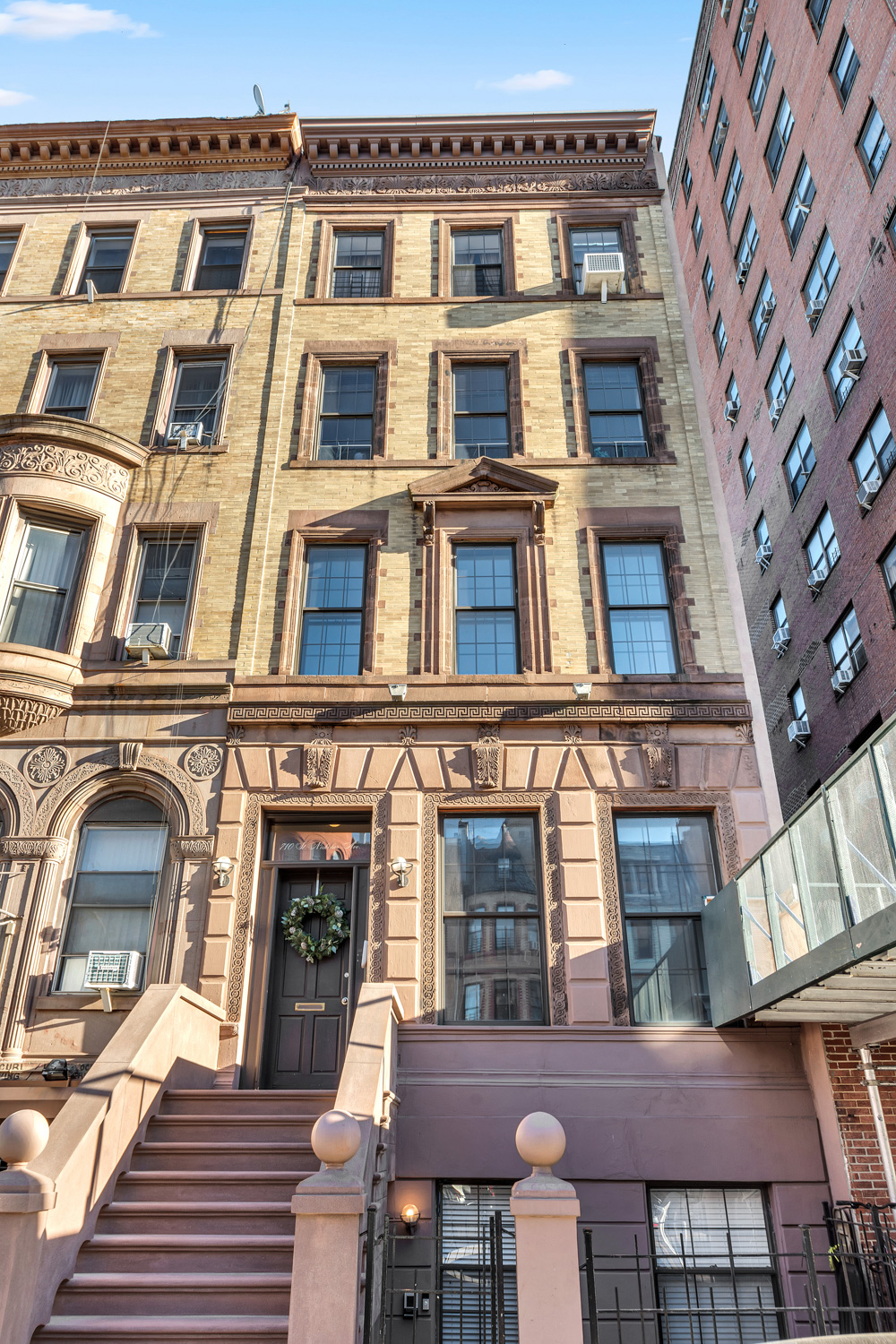 a front view of a multi story building